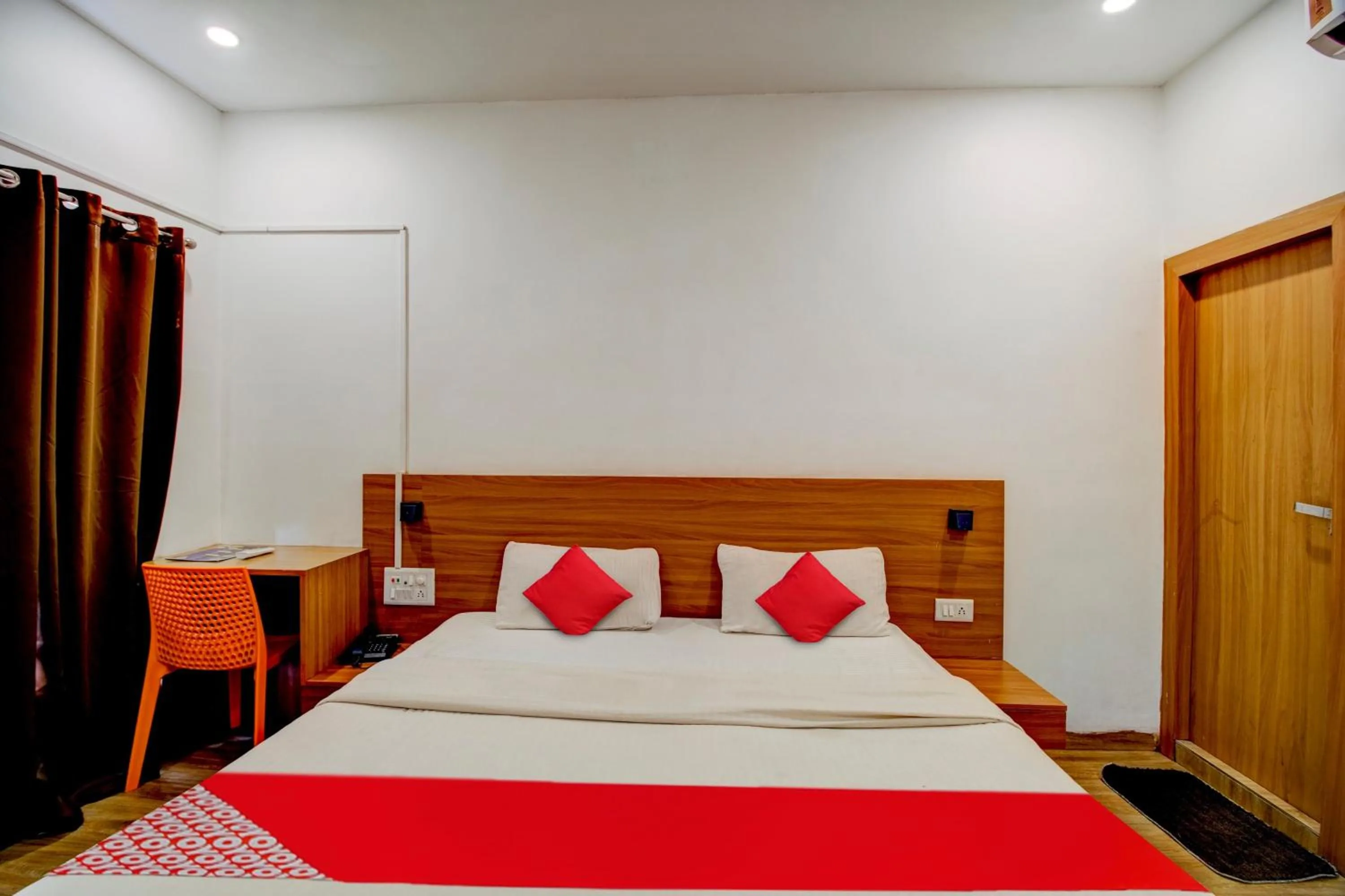 Bedroom, Bed in Hotel O Hill View Residency near ACA Stadium