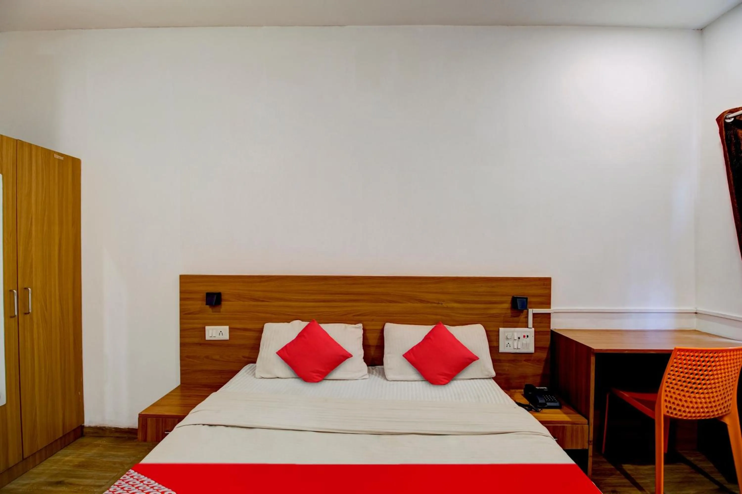 Bedroom, Bed in Hotel O Hill View Residency near ACA Stadium