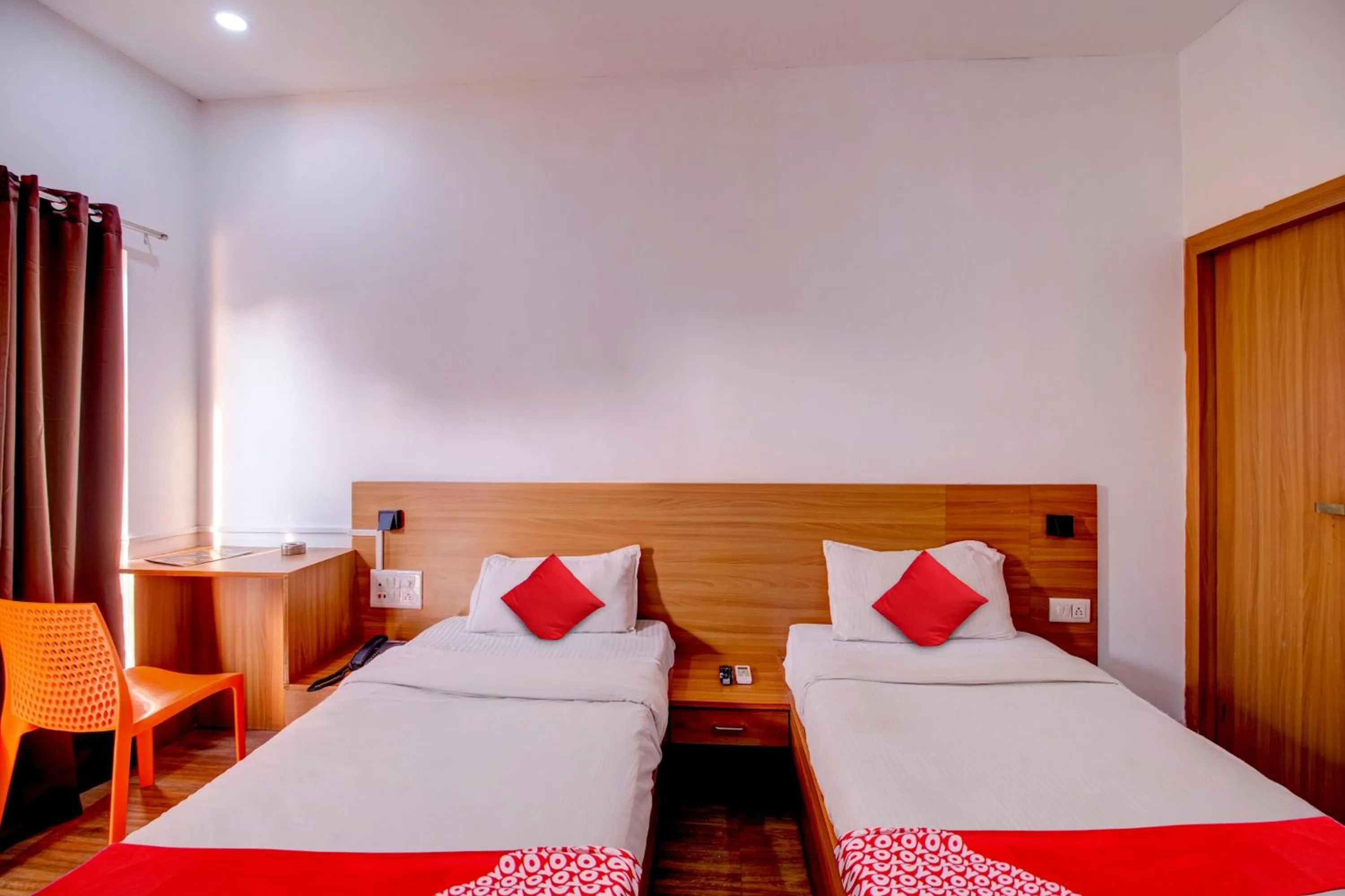 Bedroom, Bed in Hotel O Hill View Residency near ACA Stadium