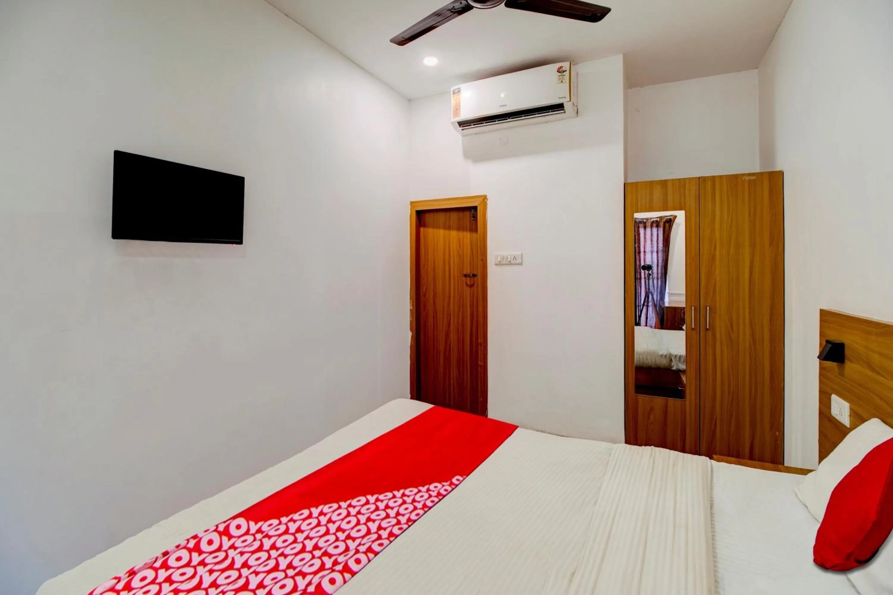 Bedroom, Bed in Hotel O Hill View Residency near ACA Stadium