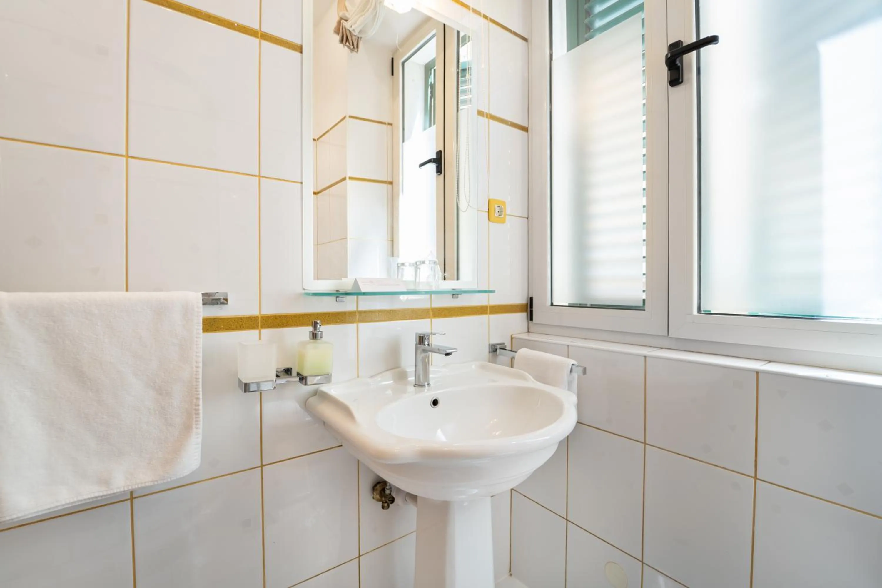 Bathroom in Hotel Peristil