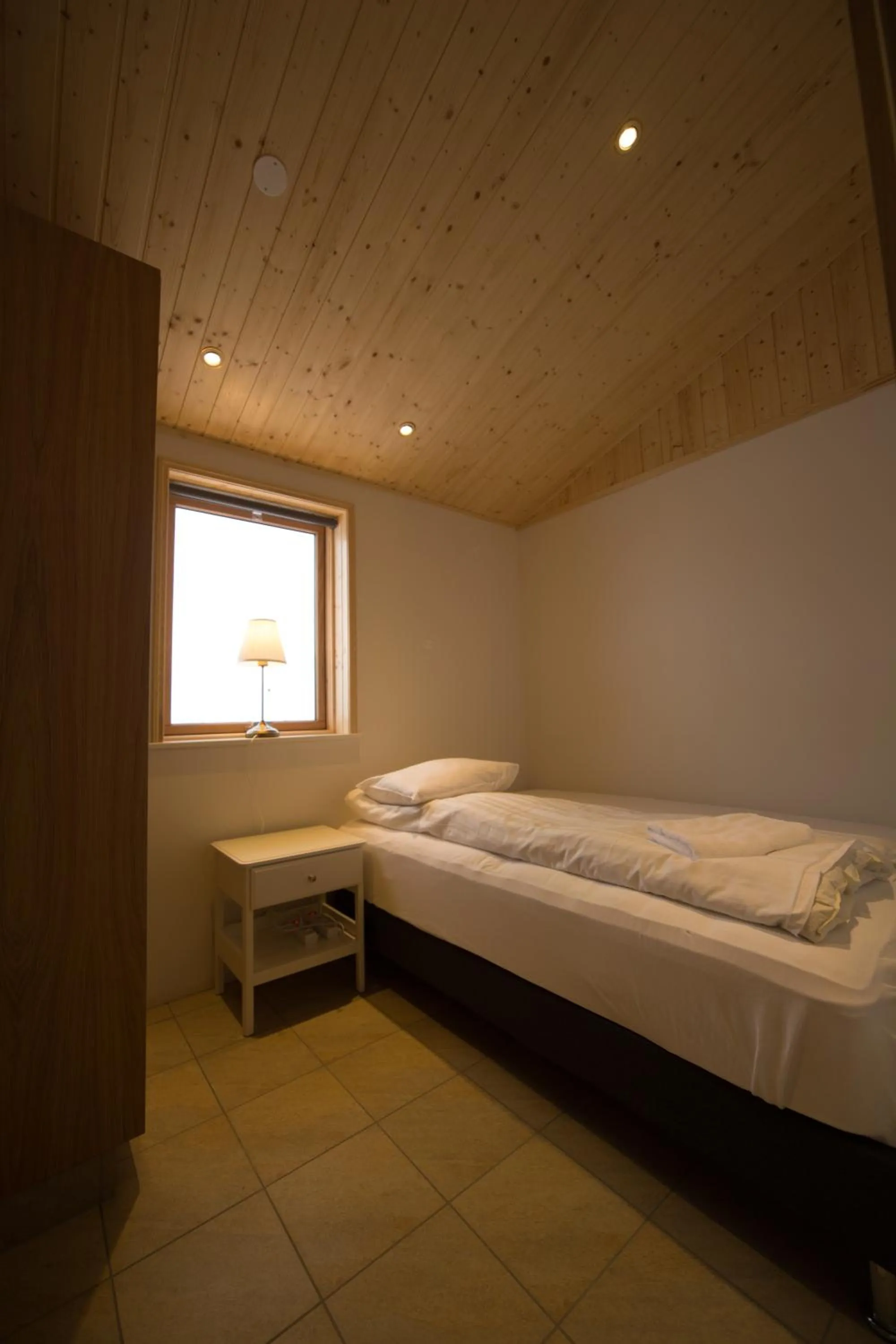 Bed in Dimmuborgir Guesthouse