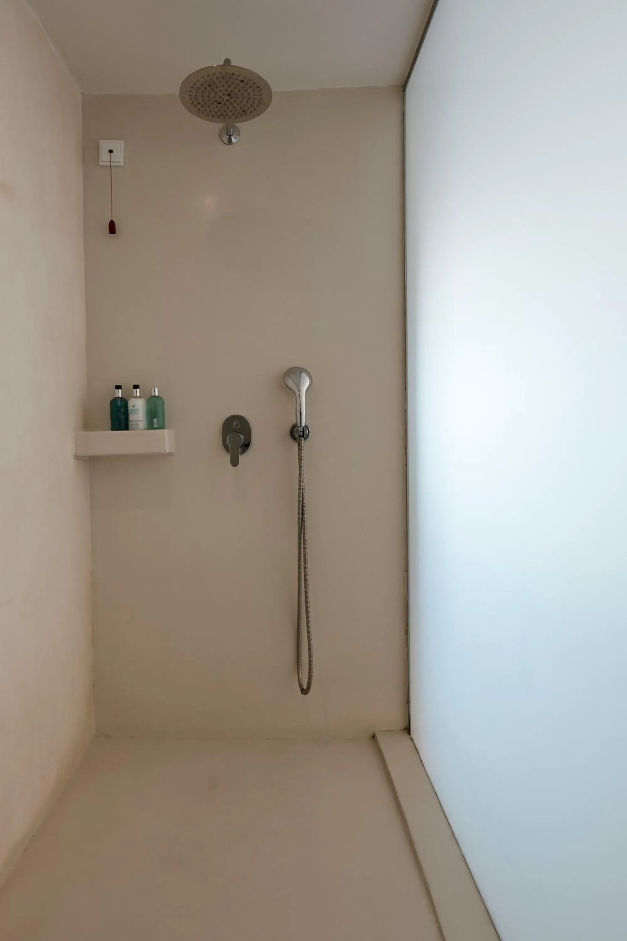 Shower in Alti Santorini Suites - Caldera View Shower in Alti Santorini Suites - Caldera View