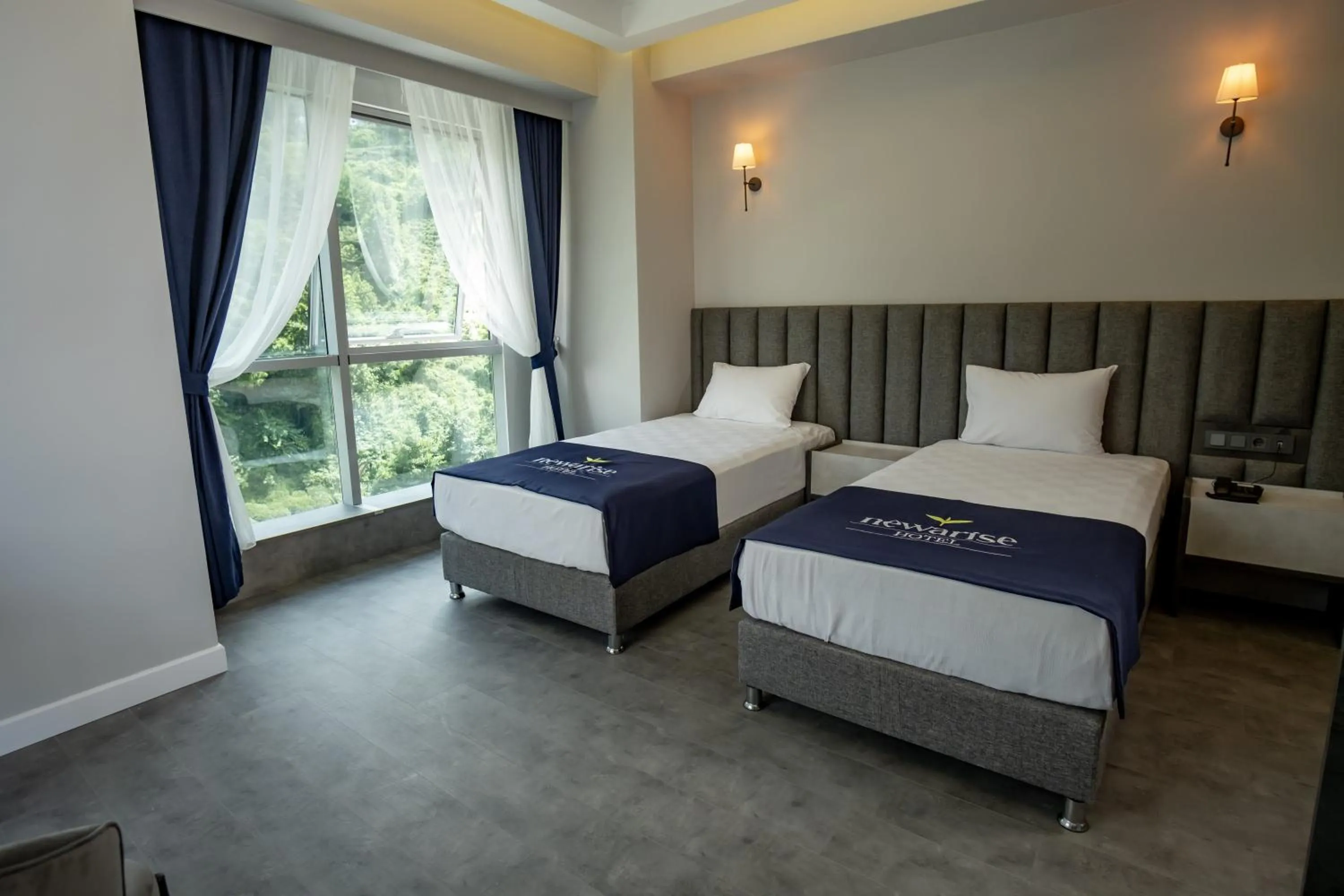 Bed in Newarise Hotel