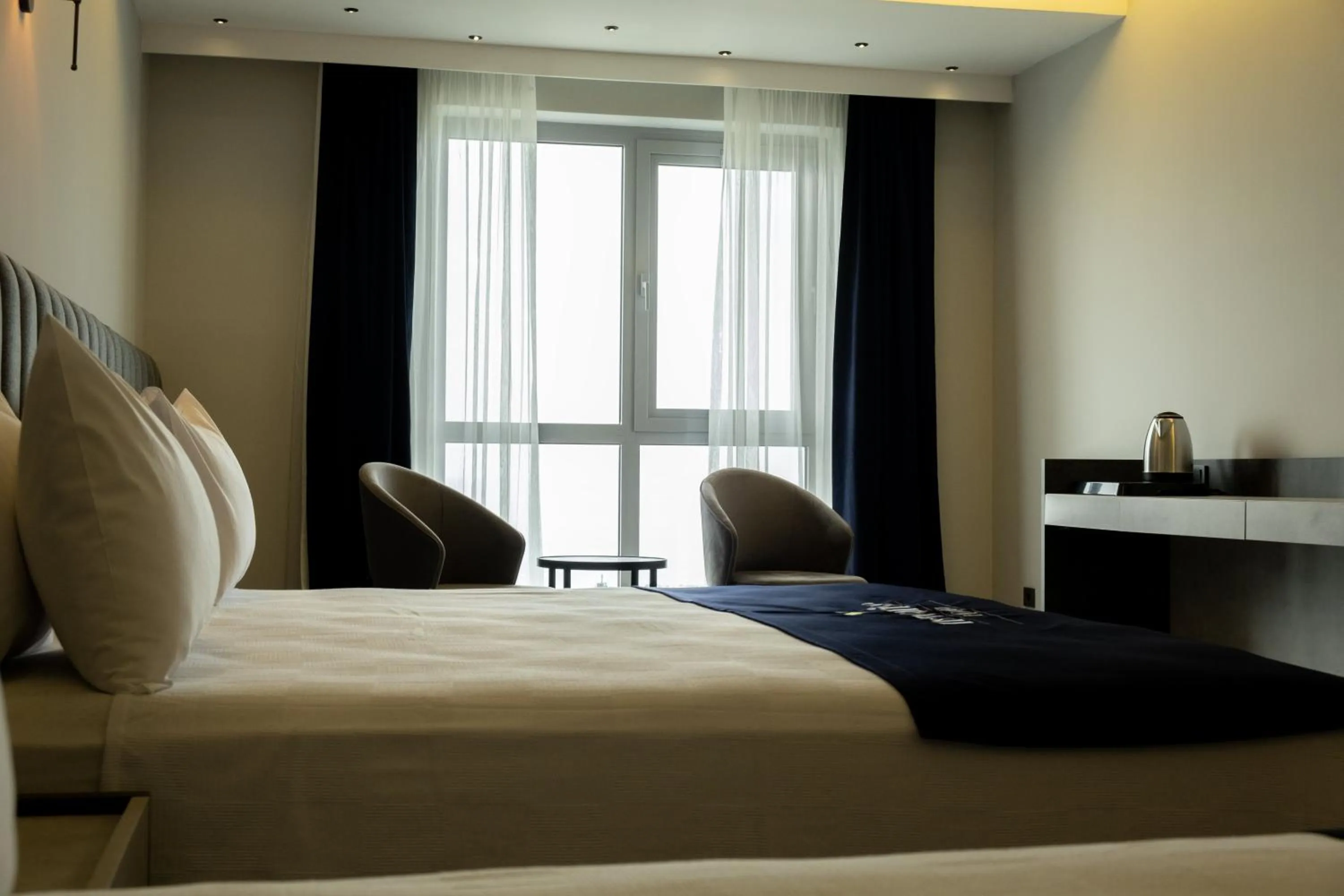 Bed in Newarise Hotel