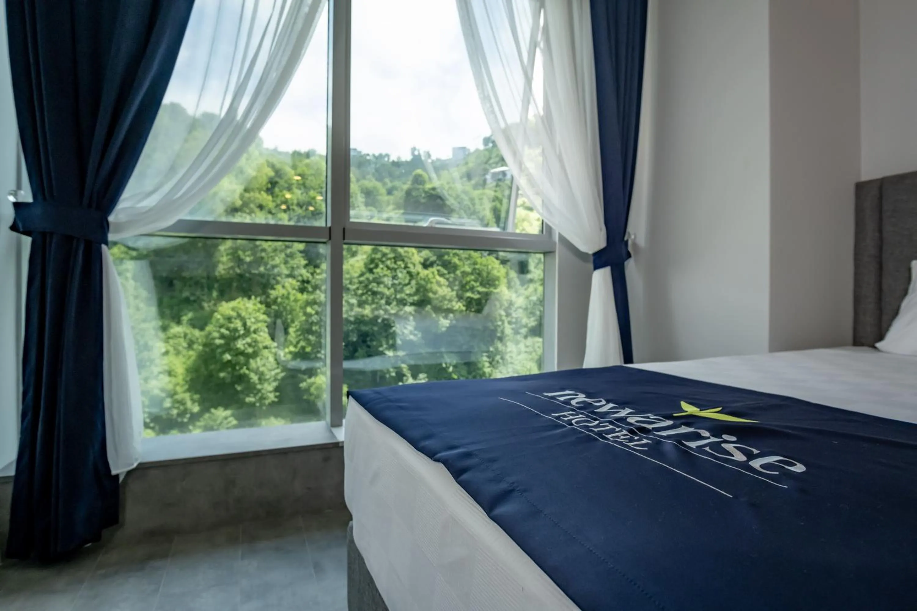 Bed in Newarise Hotel