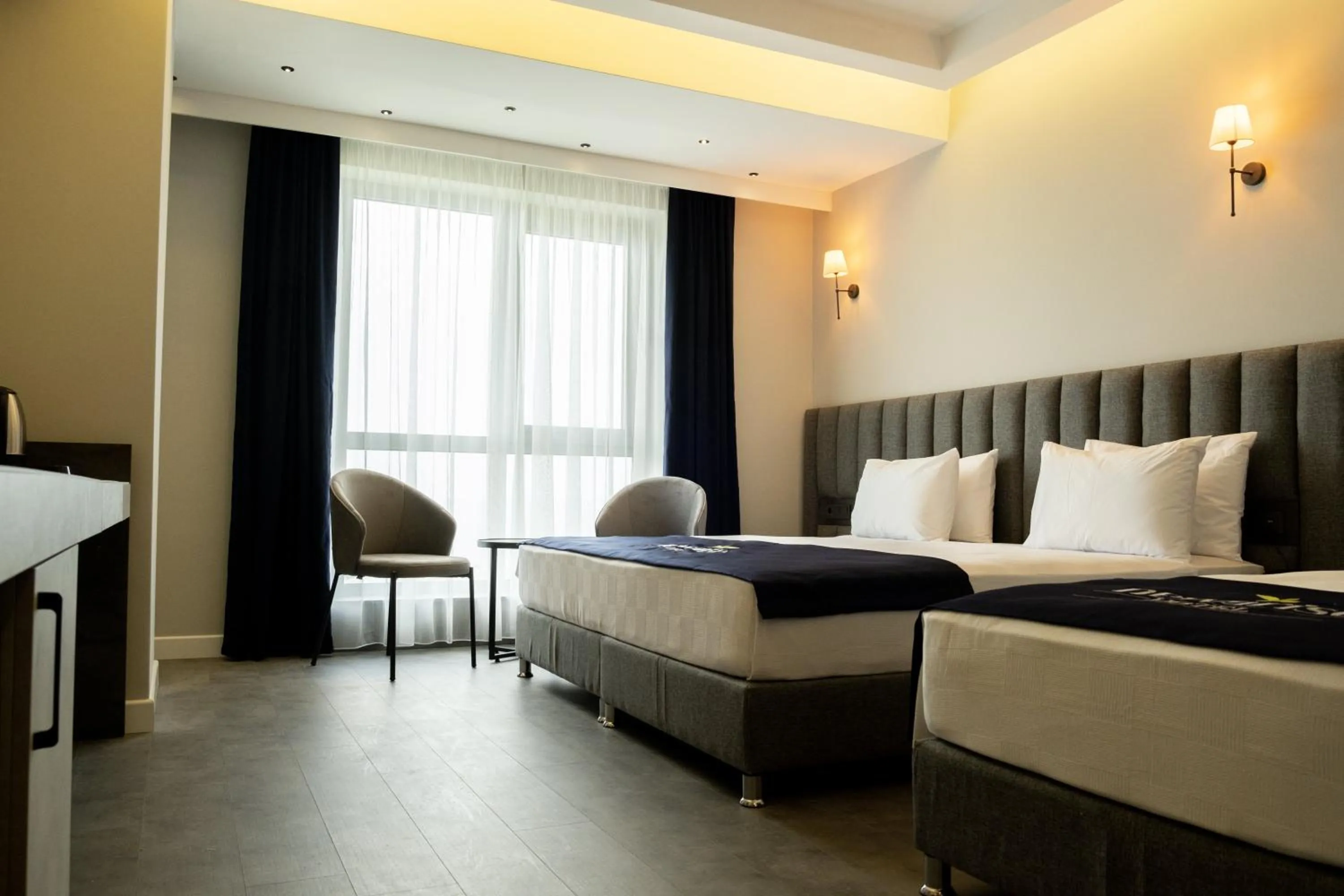 Bed in Newarise Hotel