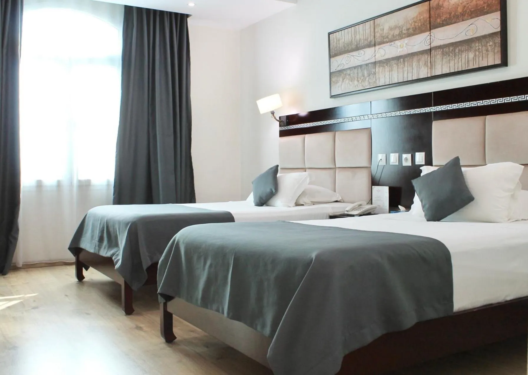 Bed in PALACE APPART HOTEL