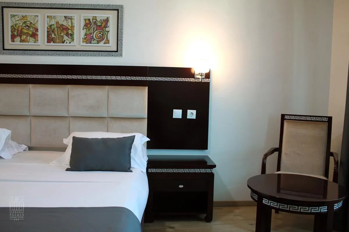 Bed in PALACE APPART HOTEL