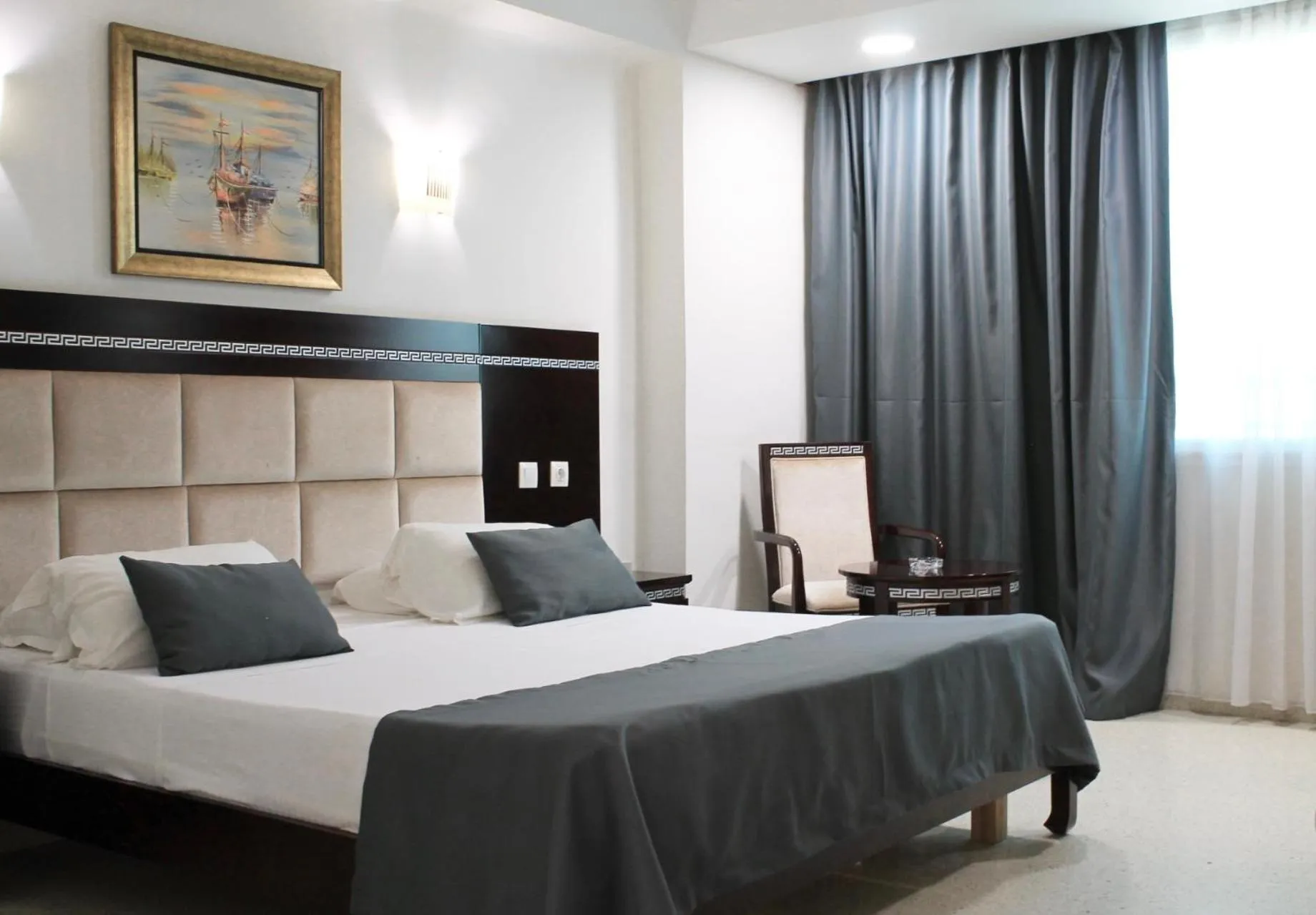 Bed in PALACE APPART HOTEL