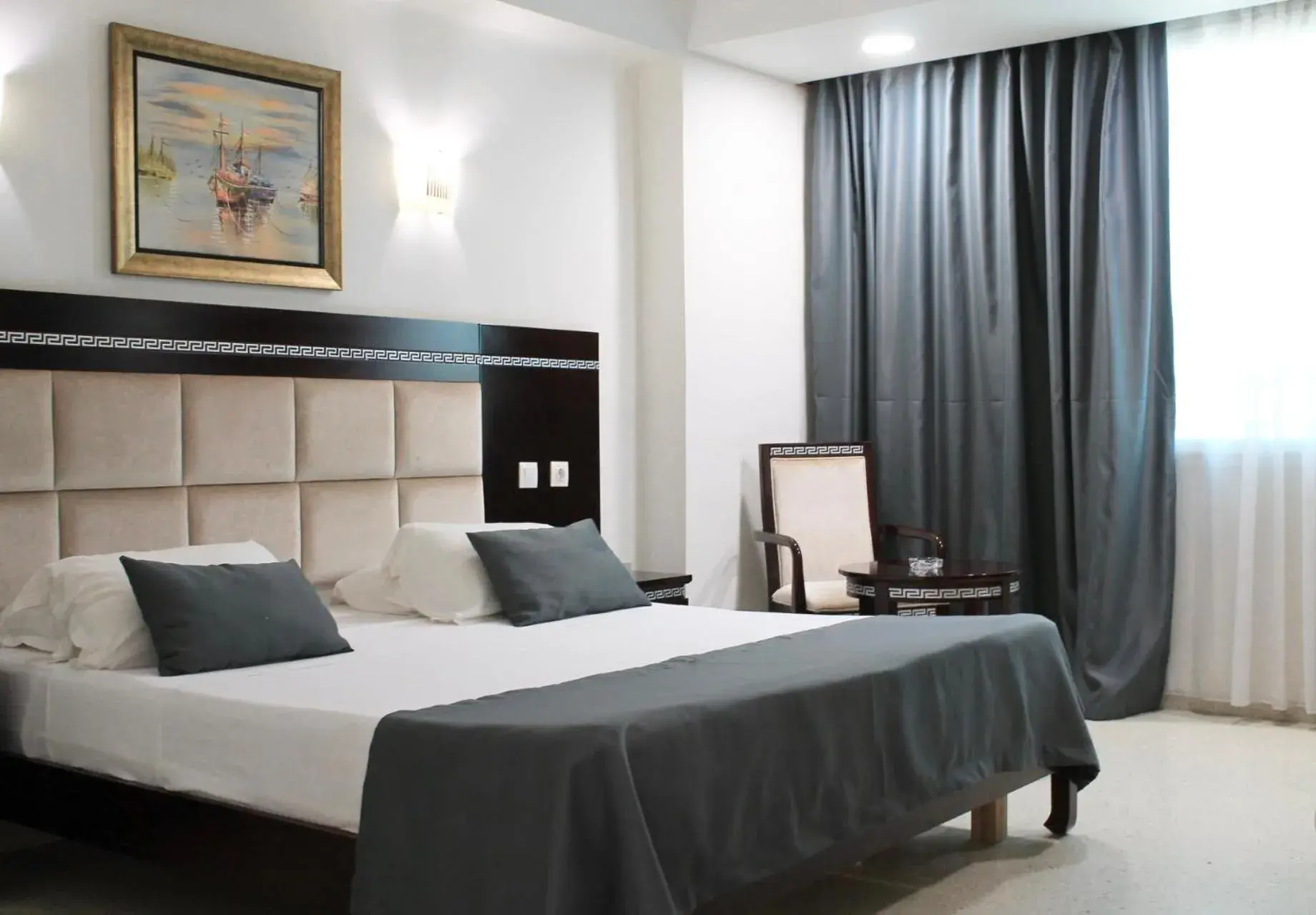 Bed in PALACE APPART HOTEL Bed in PALACE APPART HOTEL