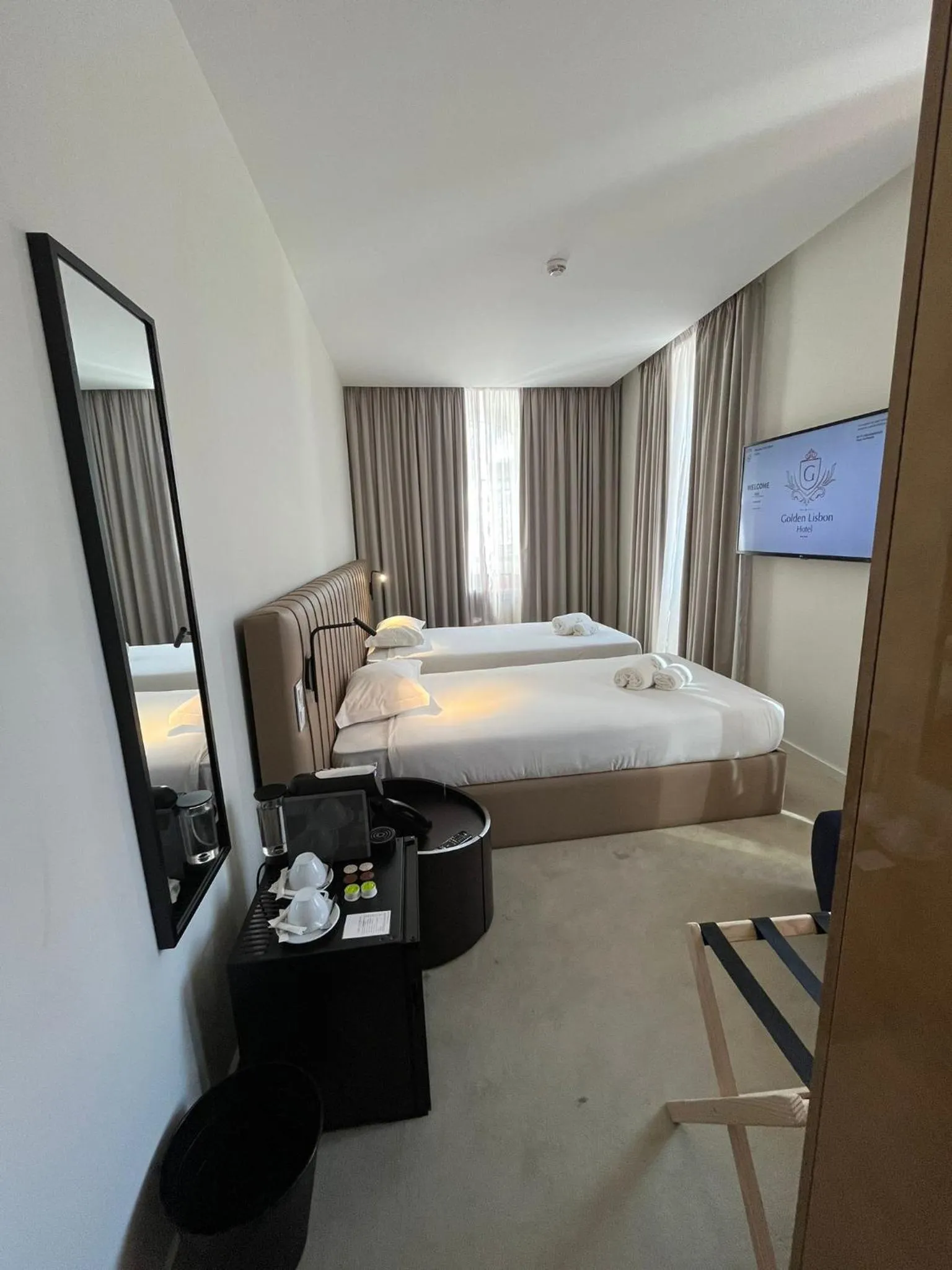 Bed in Golden Lisbon Hotel