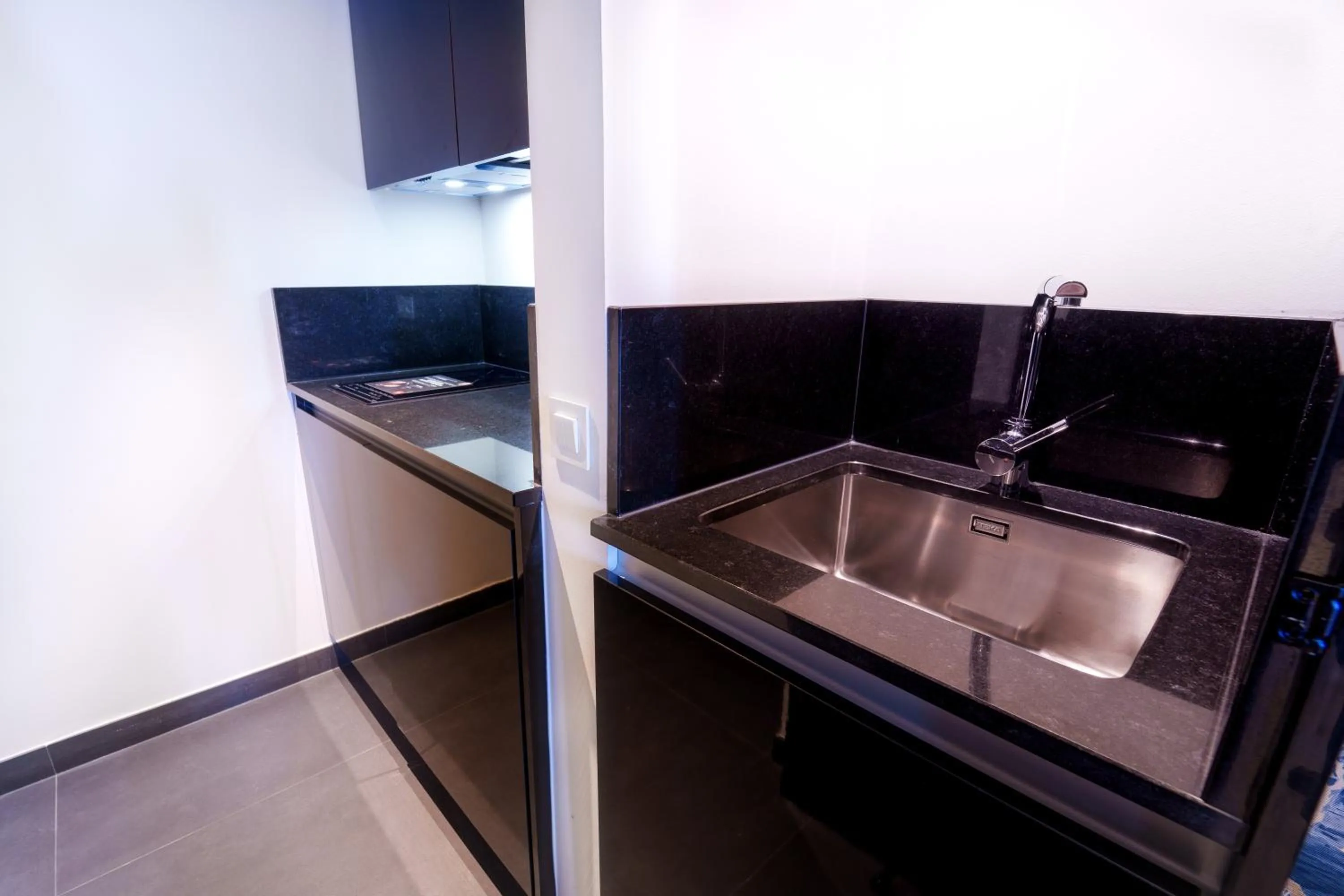 Kitchen or kitchenette in Golden Lisbon Hotel