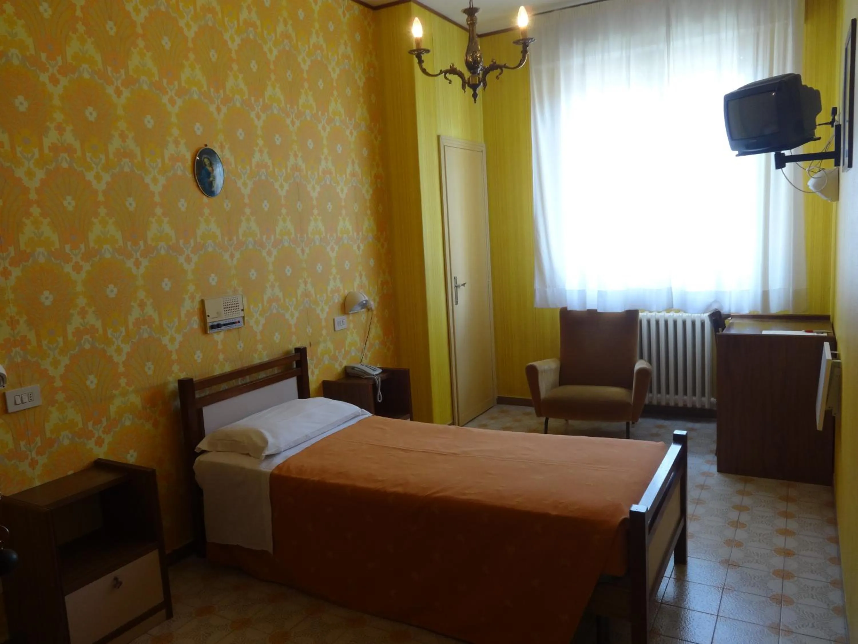 Bed in Hotel Saturno