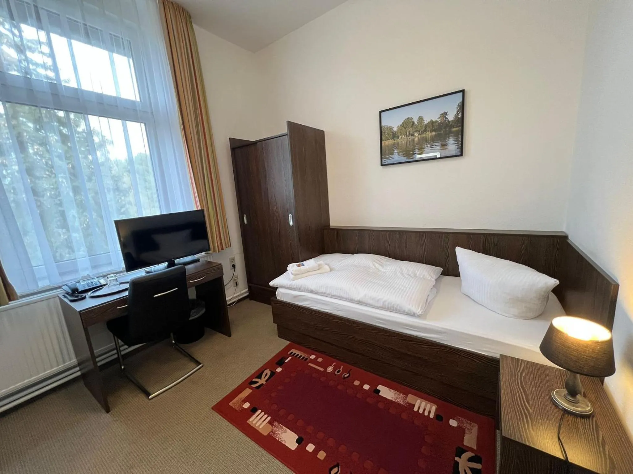Photo of the whole room, Bed in Hotel Seeschlösschen