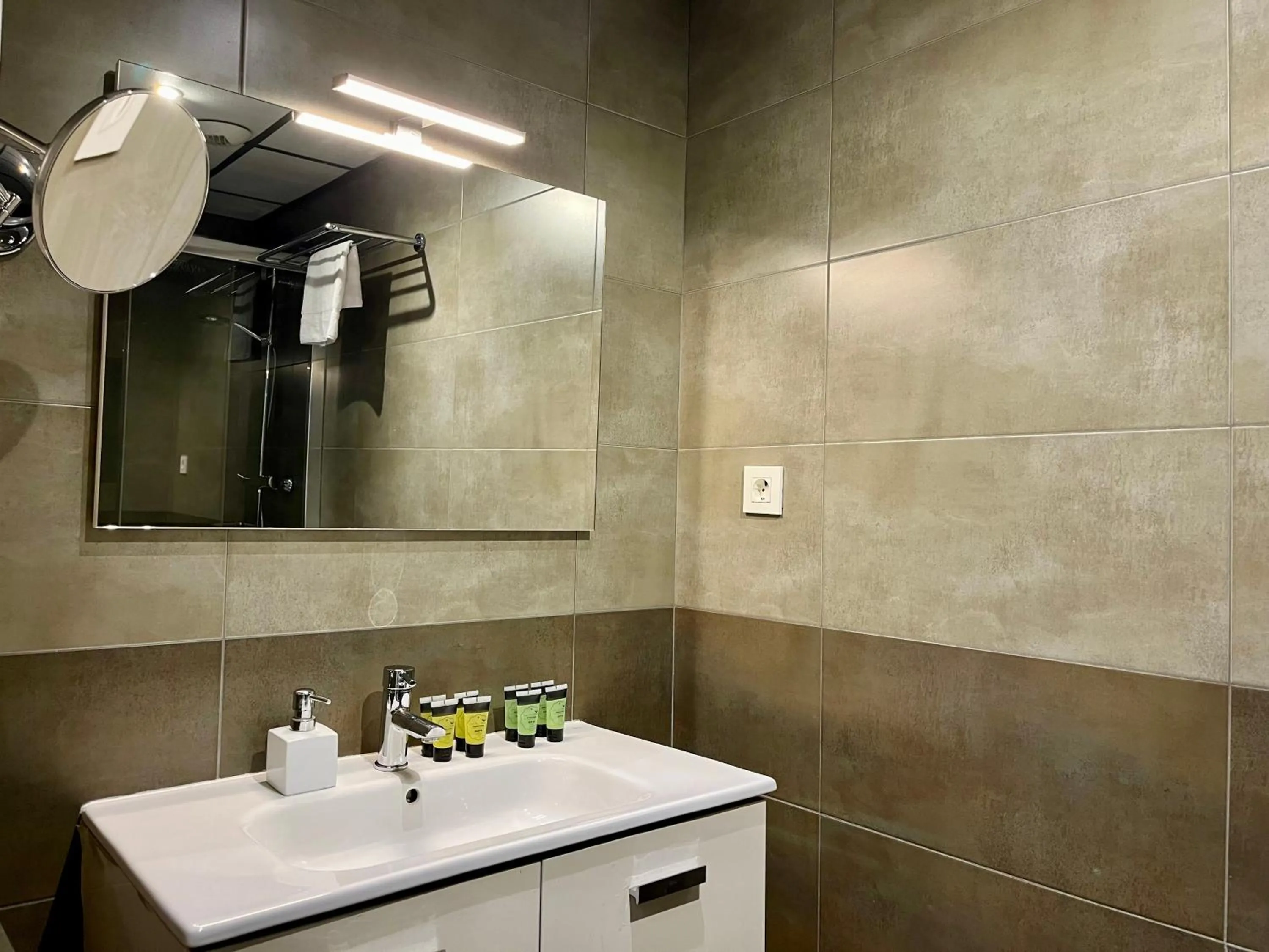 Bathroom in Feelathome Plaza Apartments