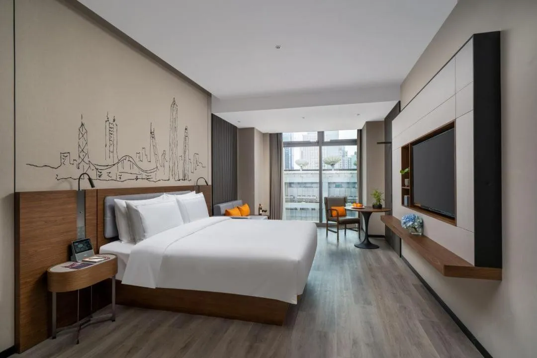 Bed in UrCove by HYATT Futian CBD-毗邻福田站和星河COCO Park 尊享免费迷你吧