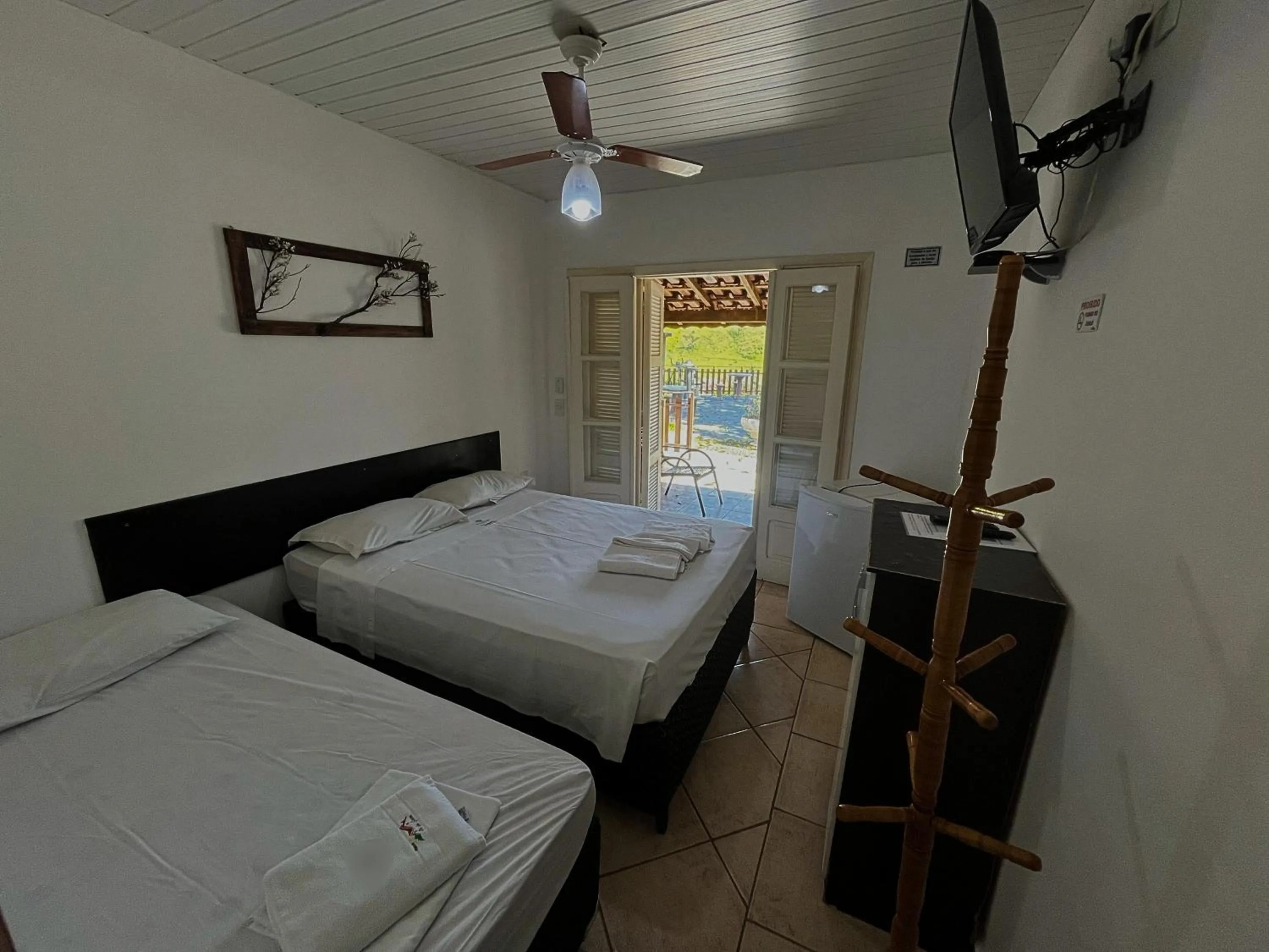 Bed in Pousada Pé da Serra