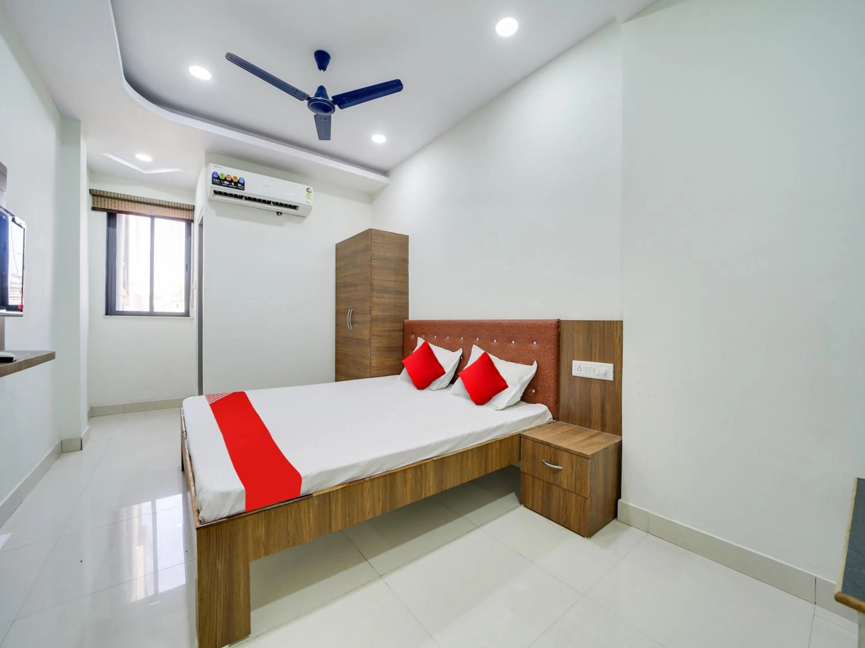 Bedroom in Super Hotel O Lalit And Marriage Garden