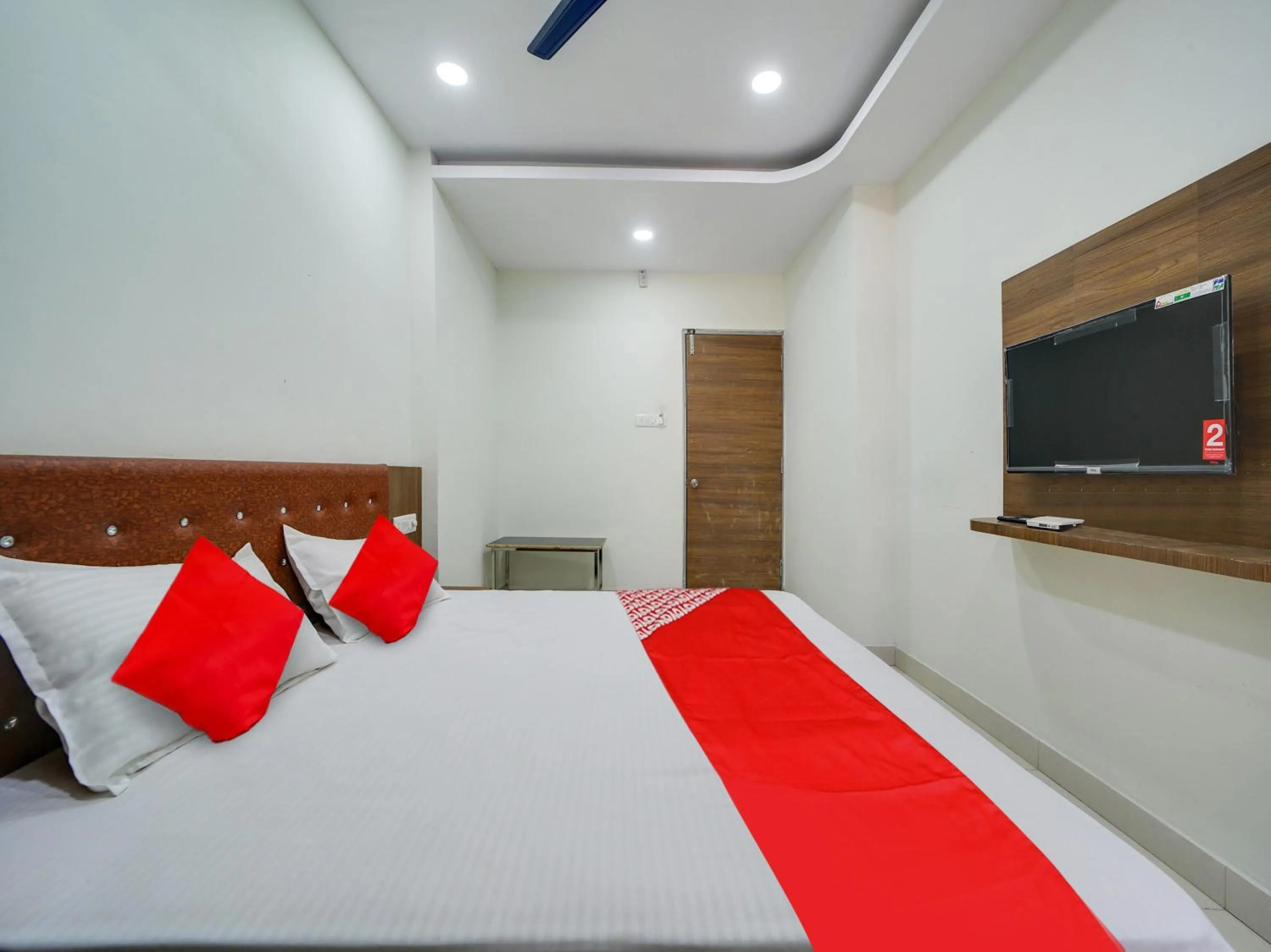 Bedroom in Super Hotel O Lalit And Marriage Garden