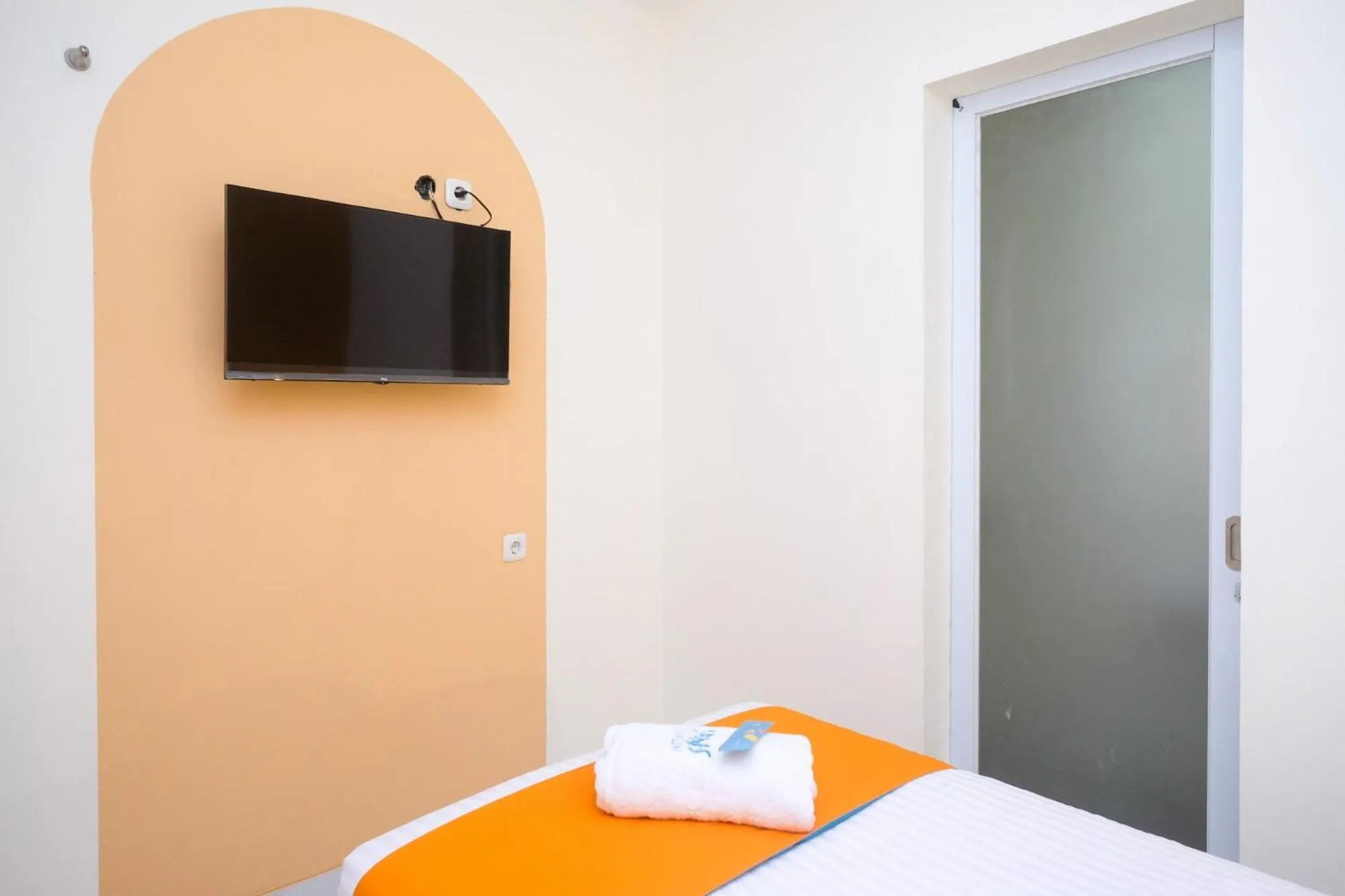 Bed in Sans Hotel Aurum Majapahit Semarang