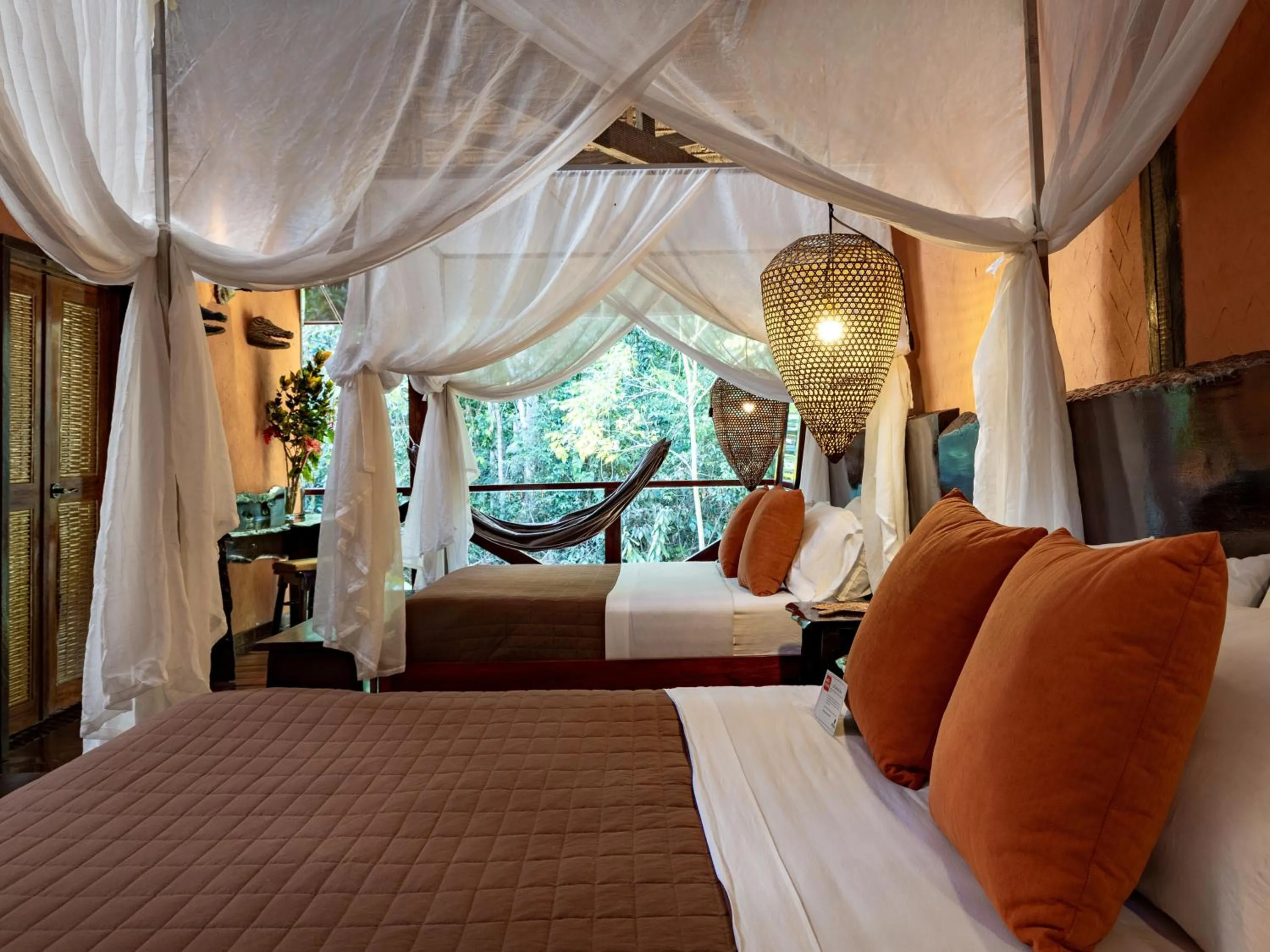Bed in Refugio Amazonas Lodge
