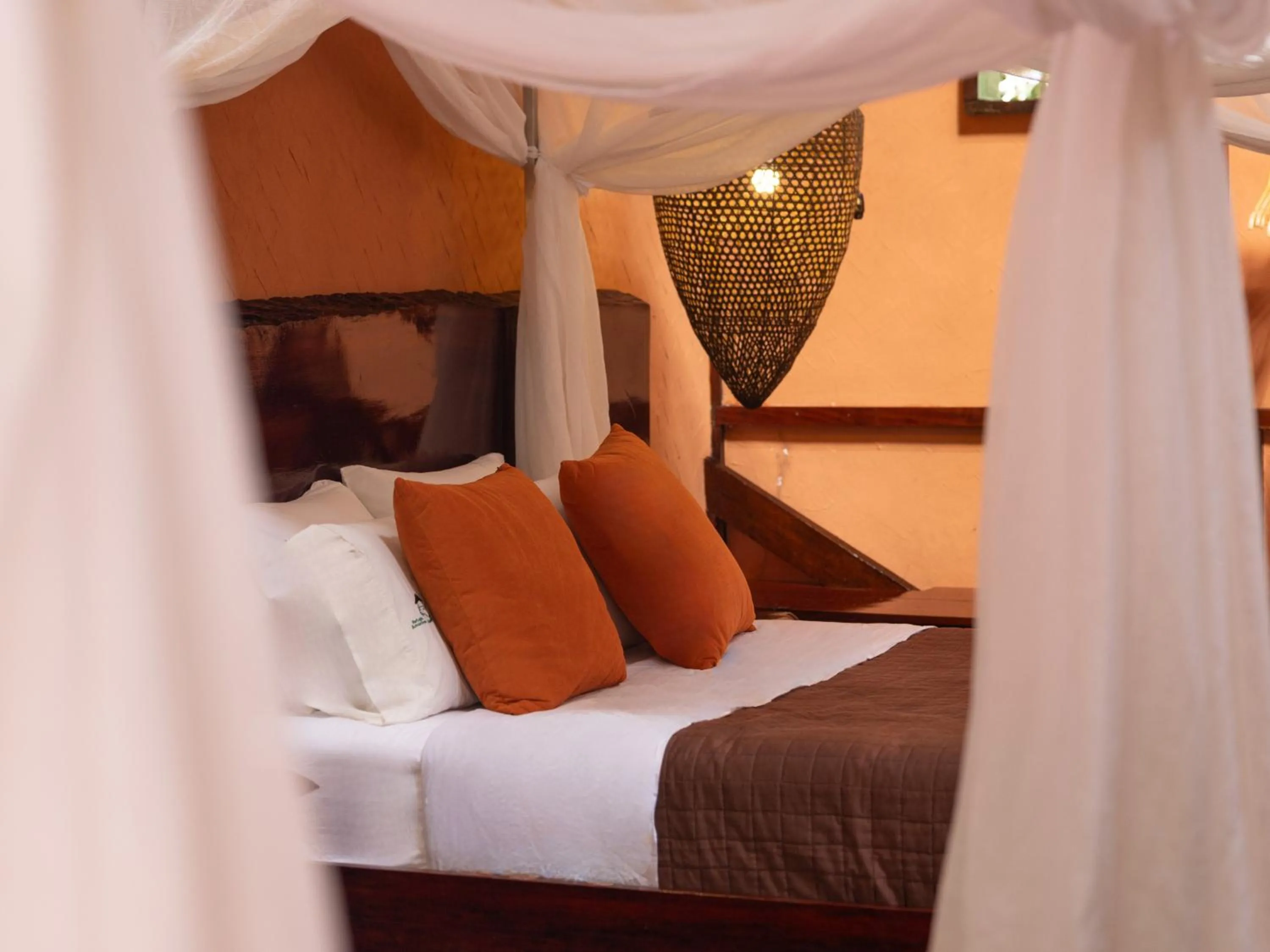 Bed in Refugio Amazonas Lodge