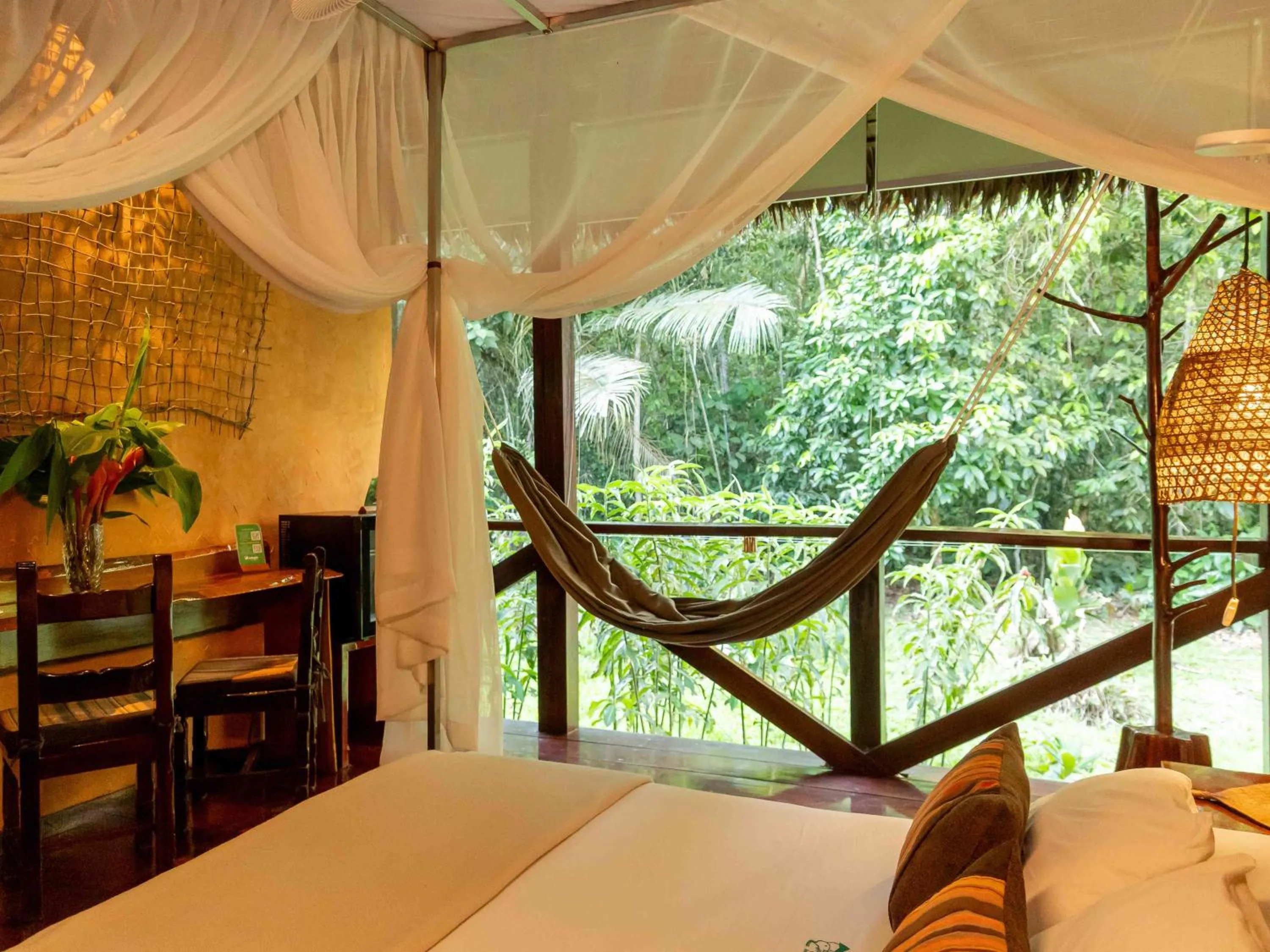 Garden view, Bed in Refugio Amazonas Lodge