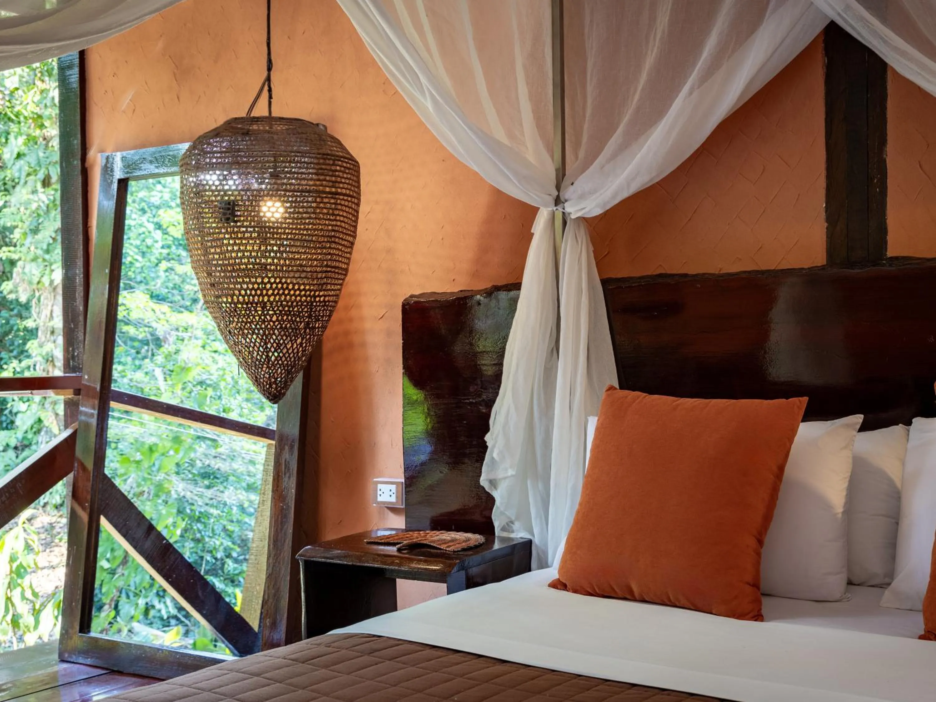Bed in Refugio Amazonas Lodge