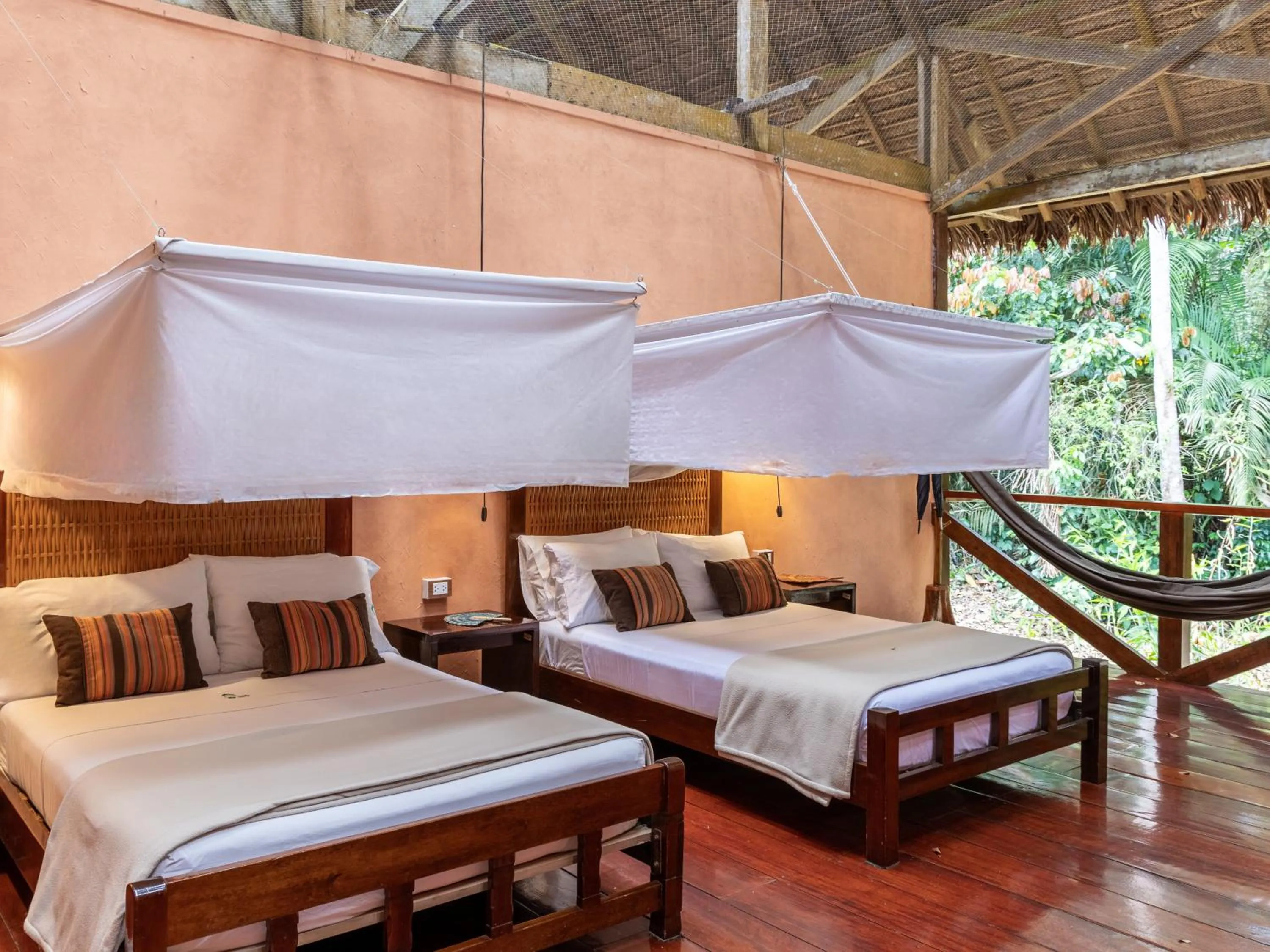 Patio, Bed in Refugio Amazonas Lodge