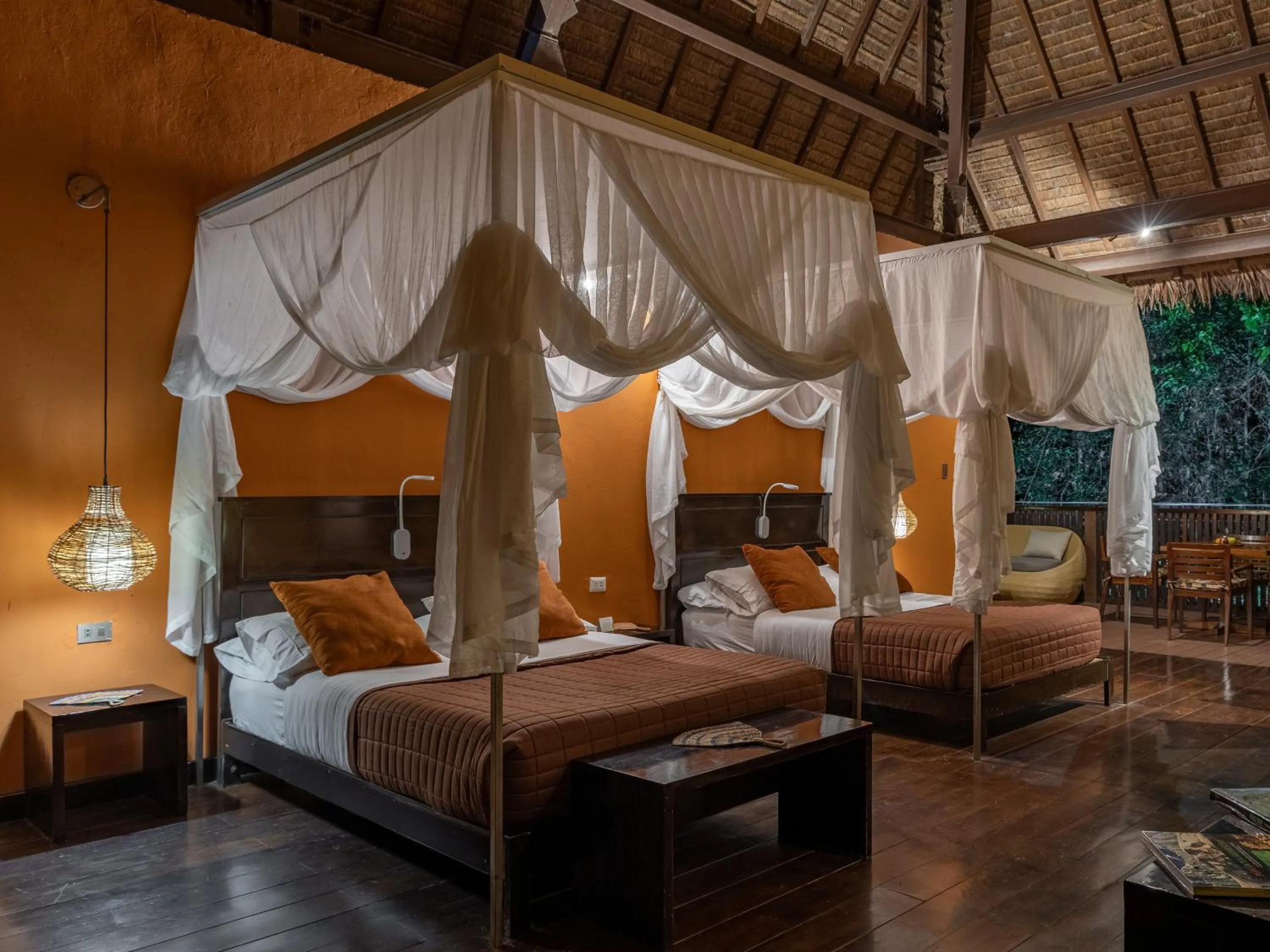 Bed in Refugio Amazonas Lodge