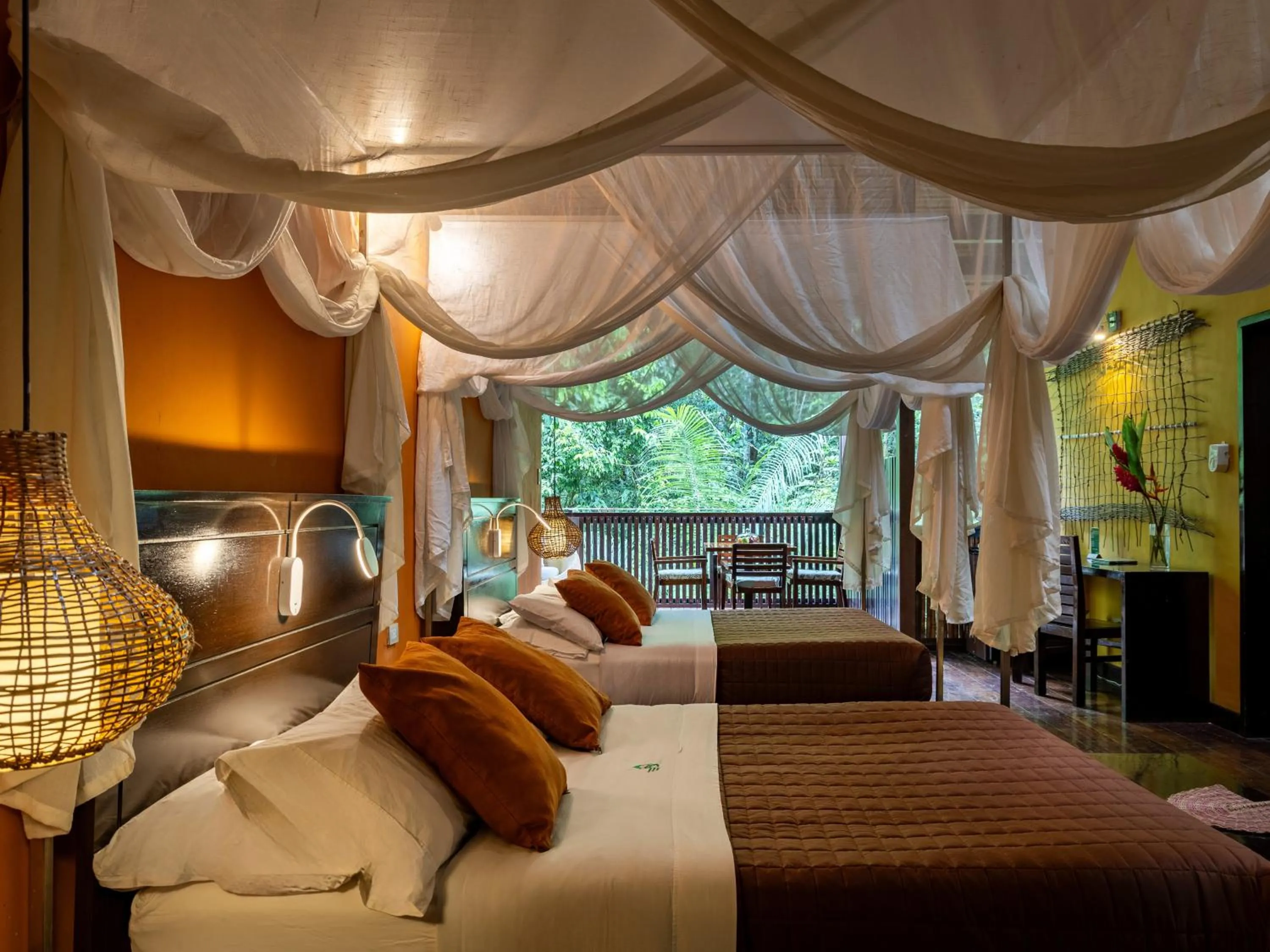 Bed in Refugio Amazonas Lodge