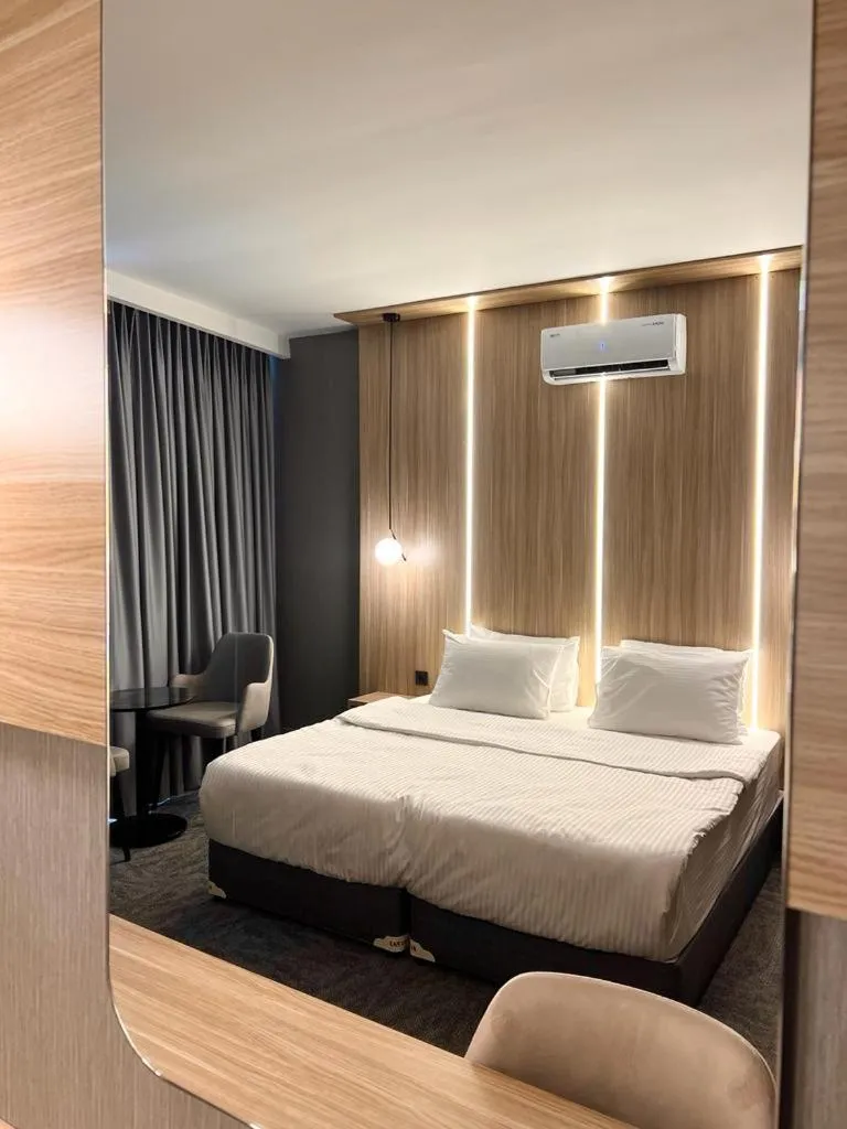 Bed in Royal Mass Airport Business Hotel