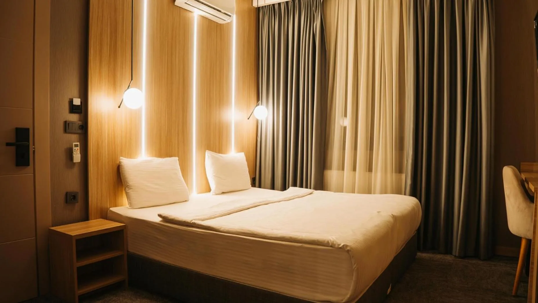 Bed in Royal Mass Airport Business Hotel