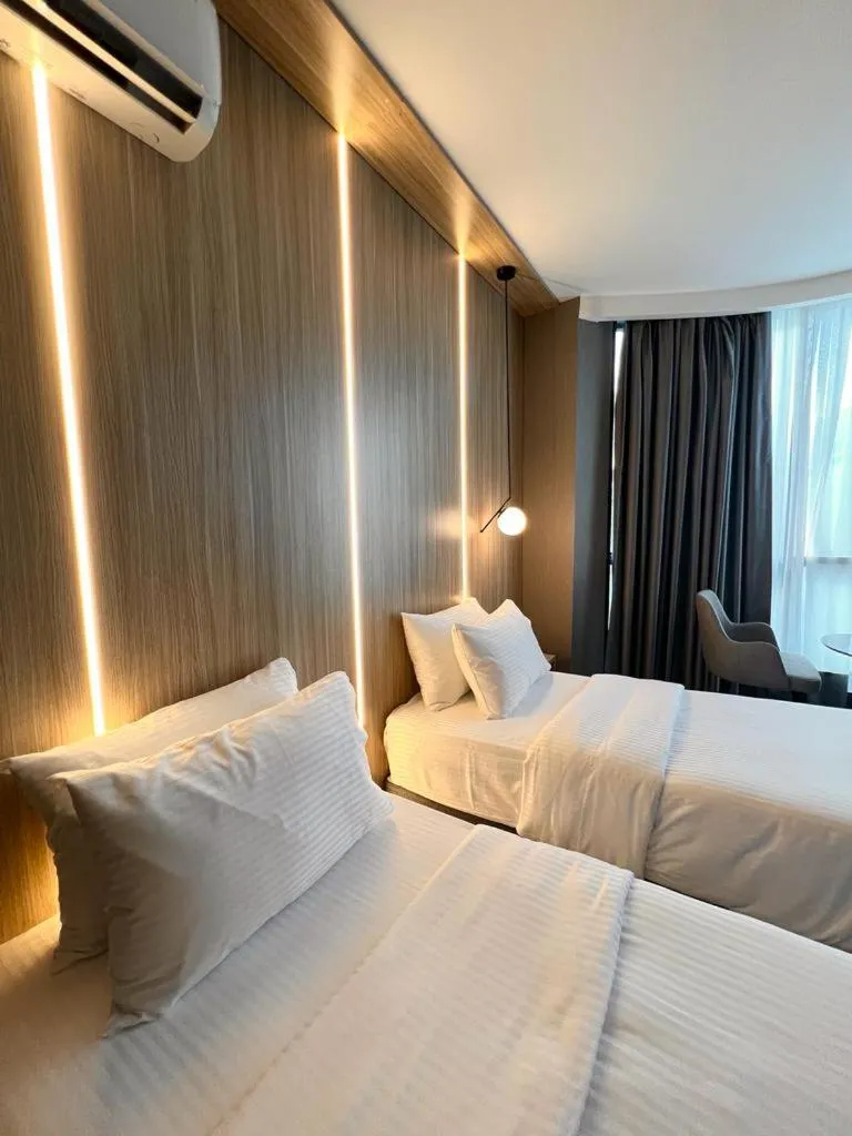 Bed in Royal Mass Airport Business Hotel