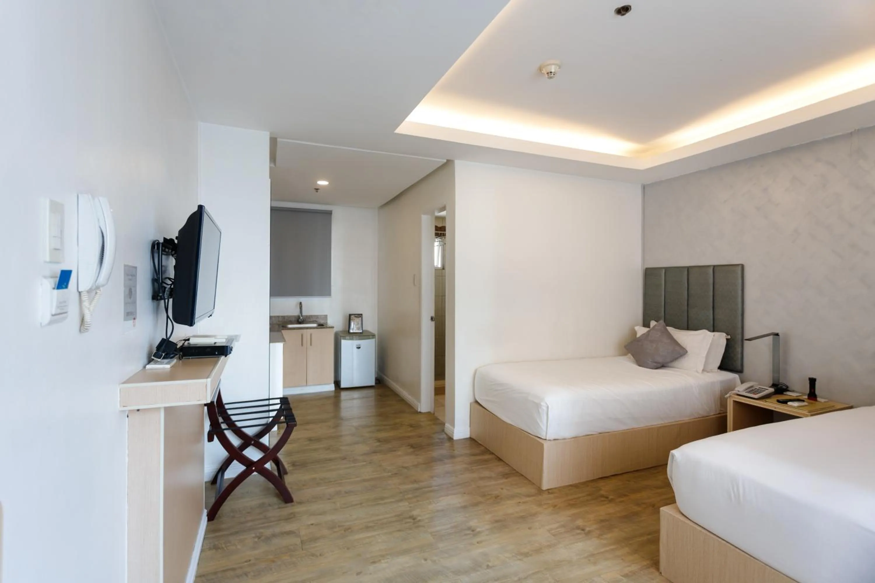 Photo of the whole room, Bed in Regency Grand Suites