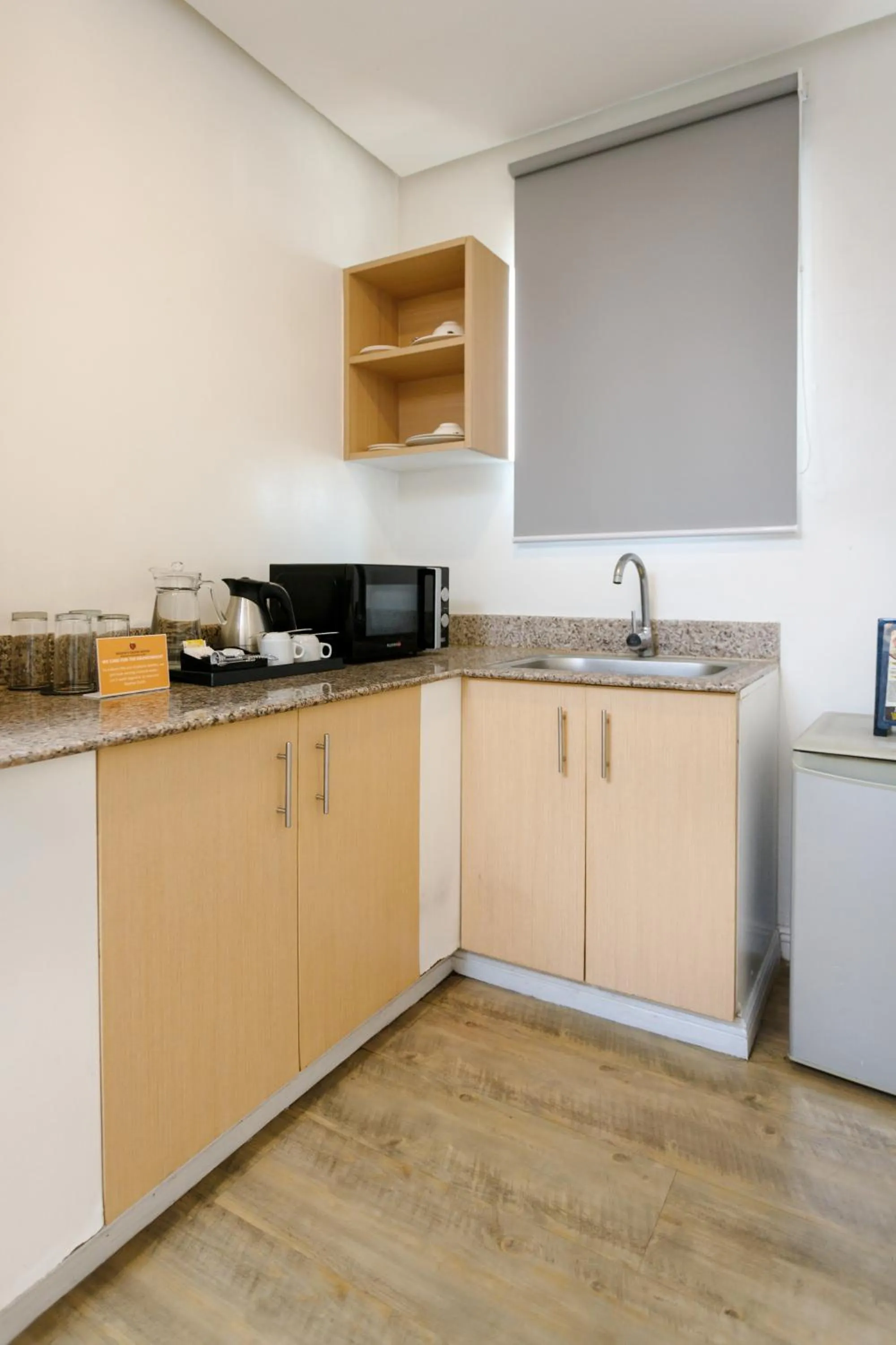 Kitchen or kitchenette in Regency Grand Suites