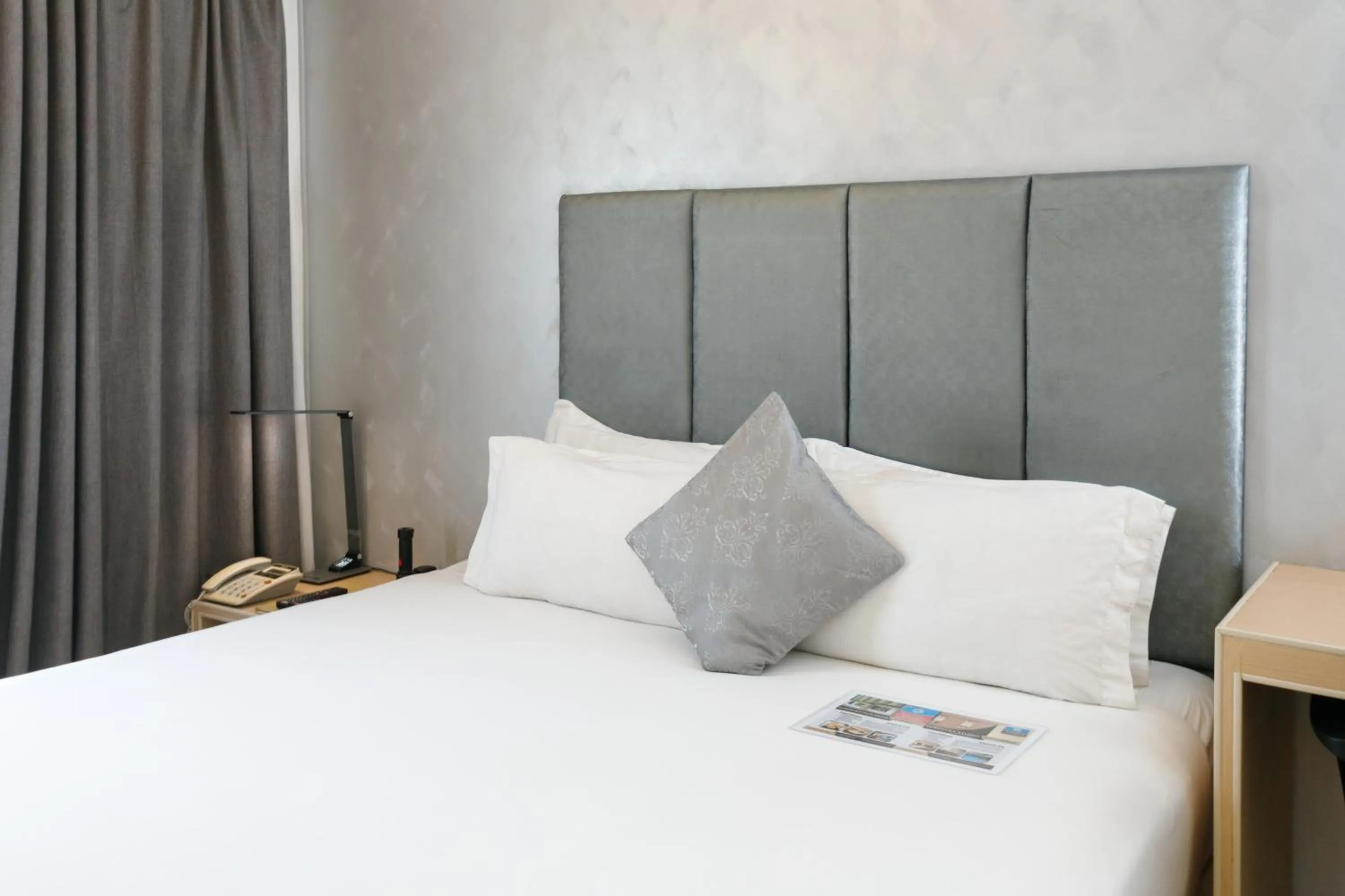 Bed in Regency Grand Suites