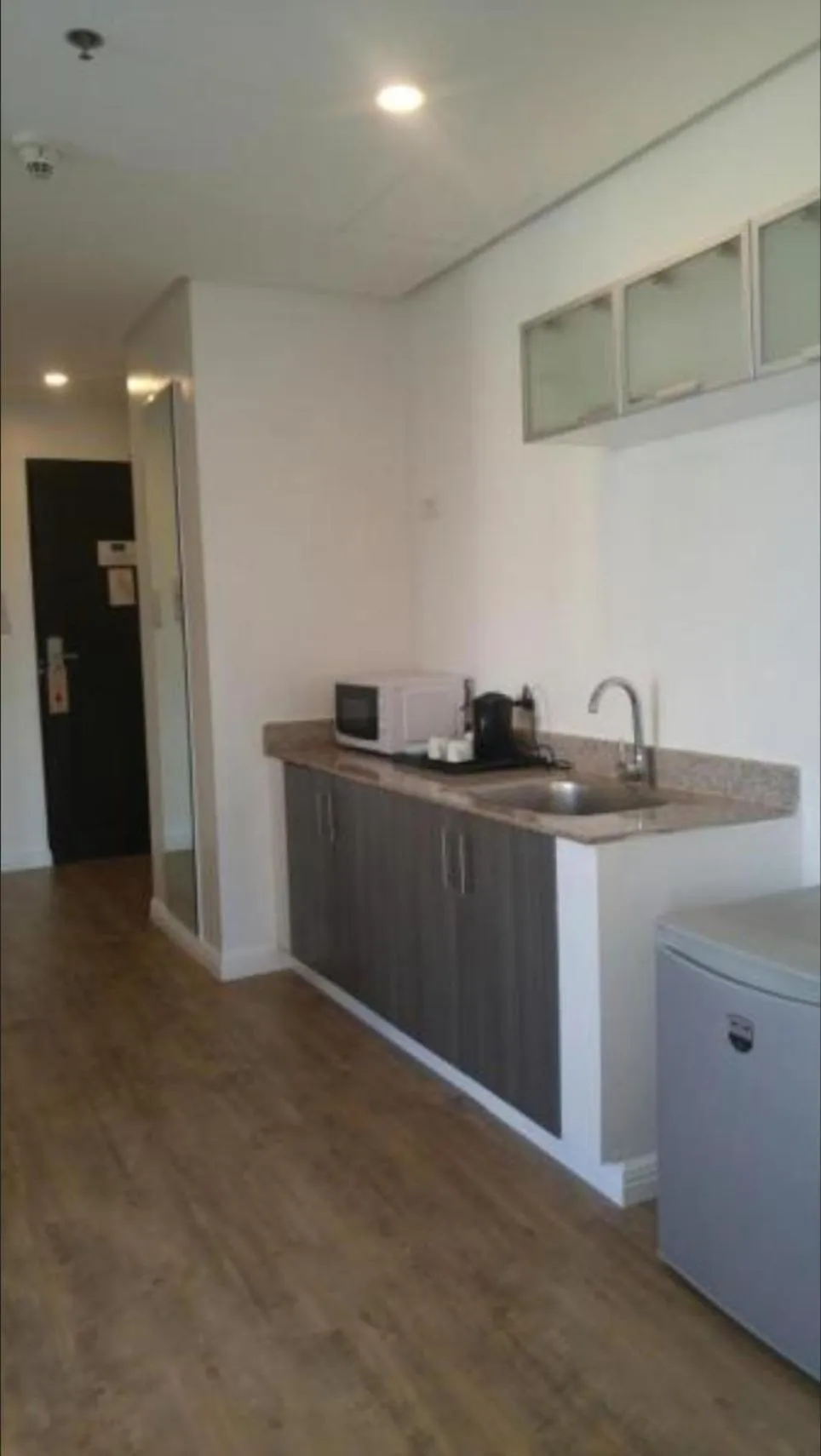 Kitchen or kitchenette in Regency Grand Suites