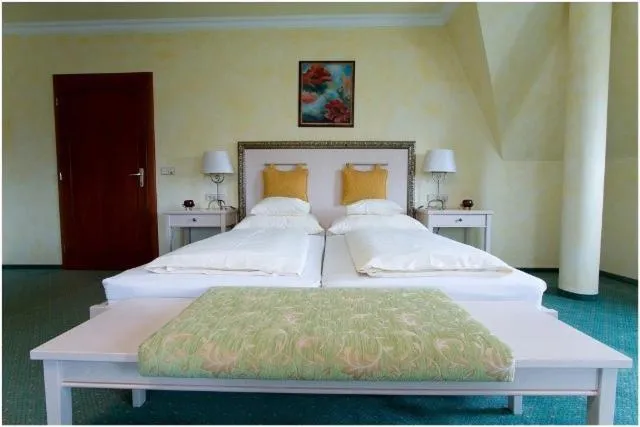 Bed in Hétkúti Wellness Hotel