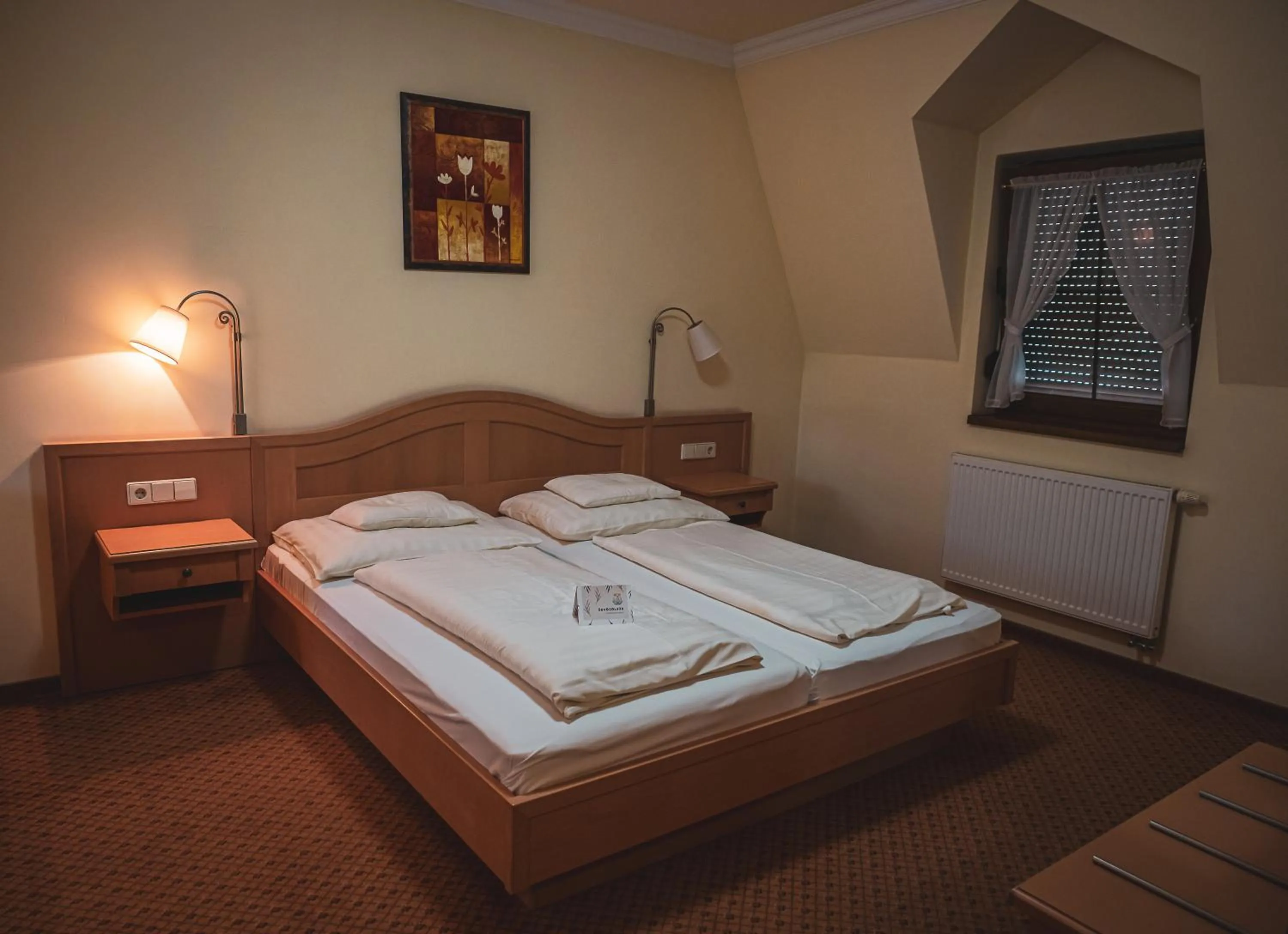 Bed in Hétkúti Wellness Hotel