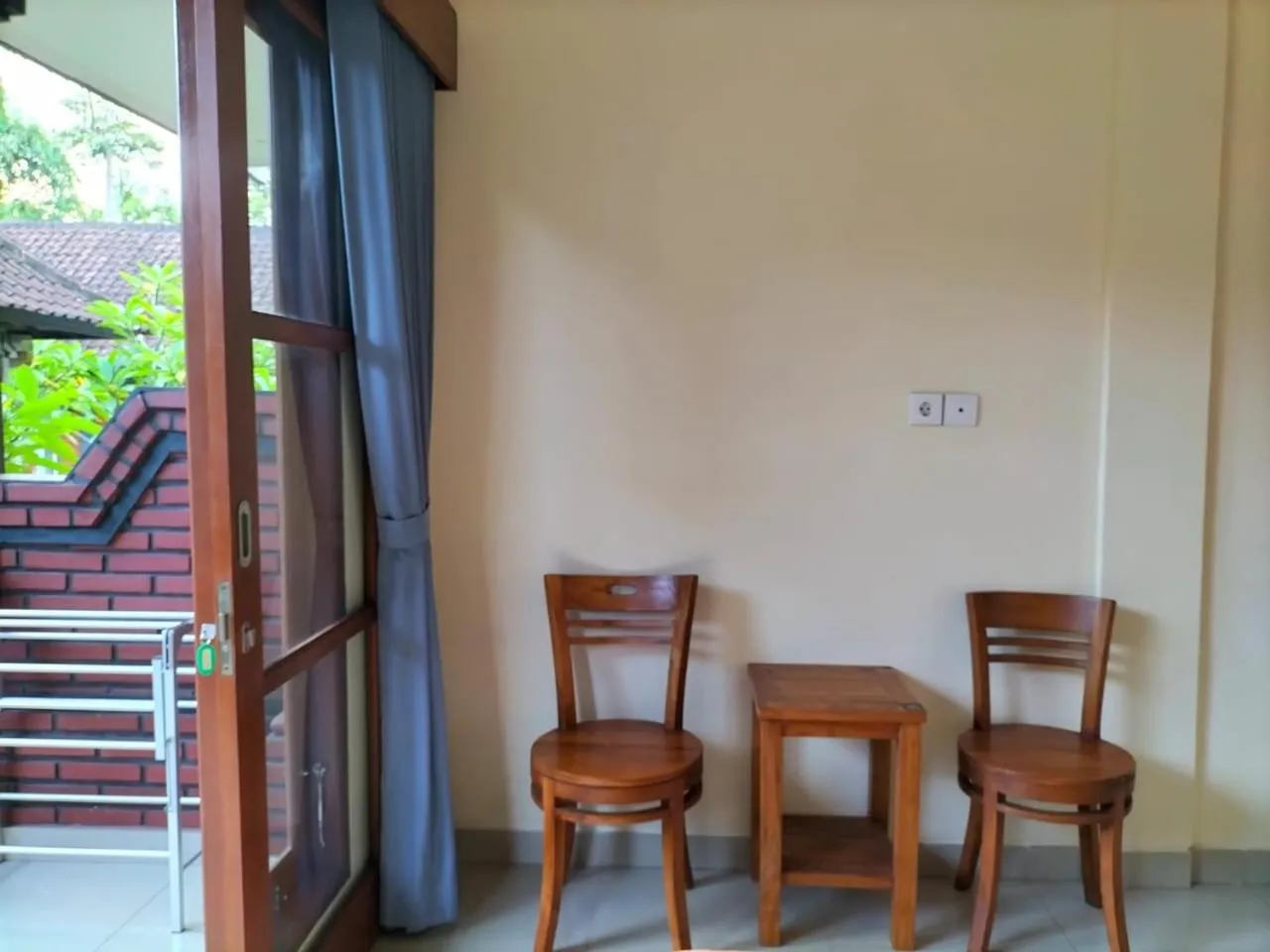 Bedroom in Ojek's Homestay