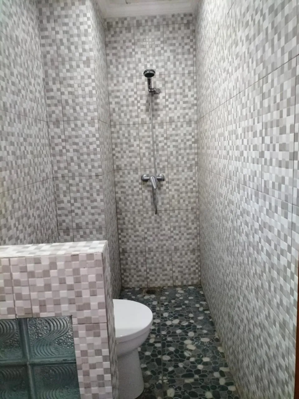 Bathroom in Ojek's Homestay