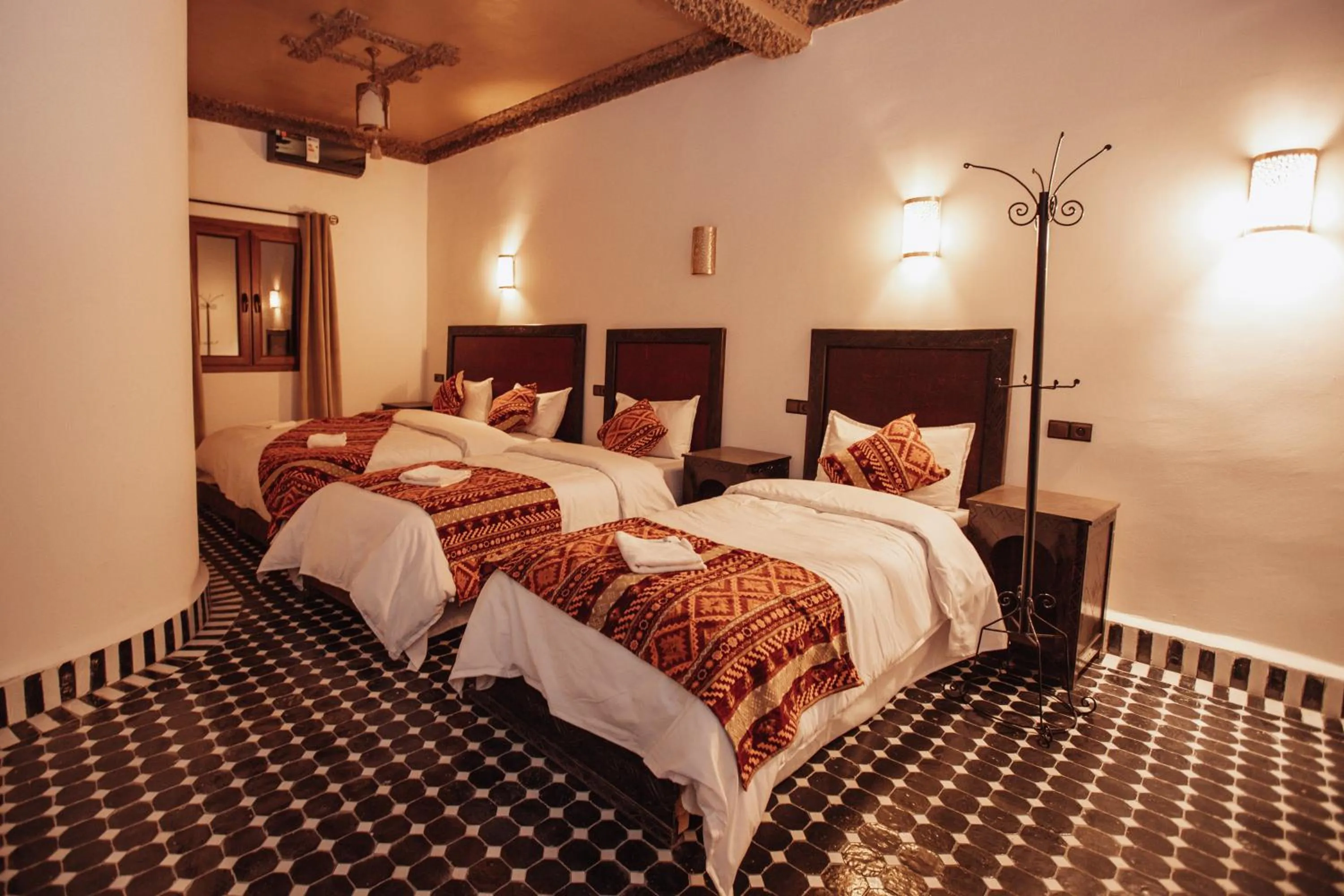 Bed in Riad Merzouga Dunes