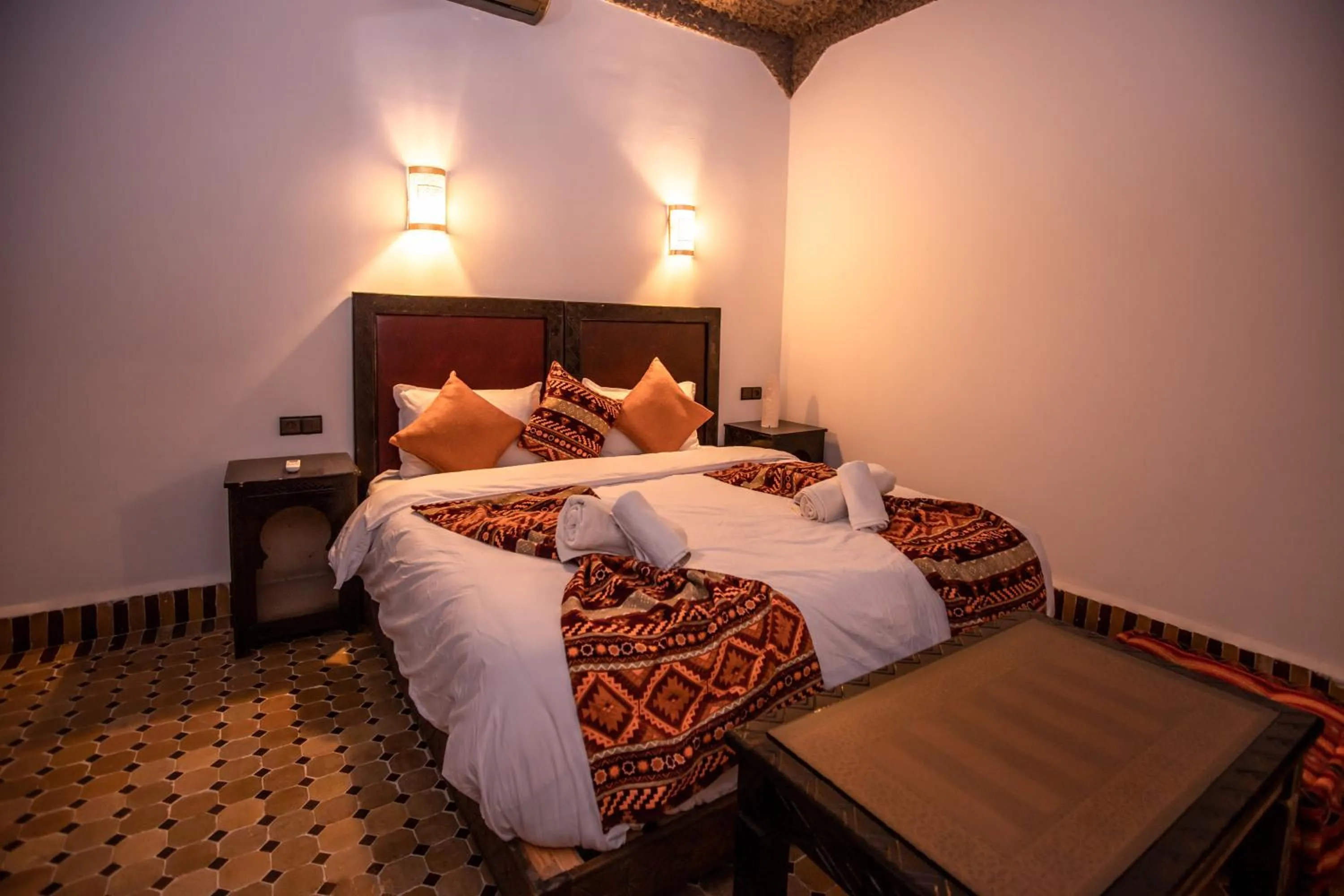 Bed in Riad Merzouga Dunes