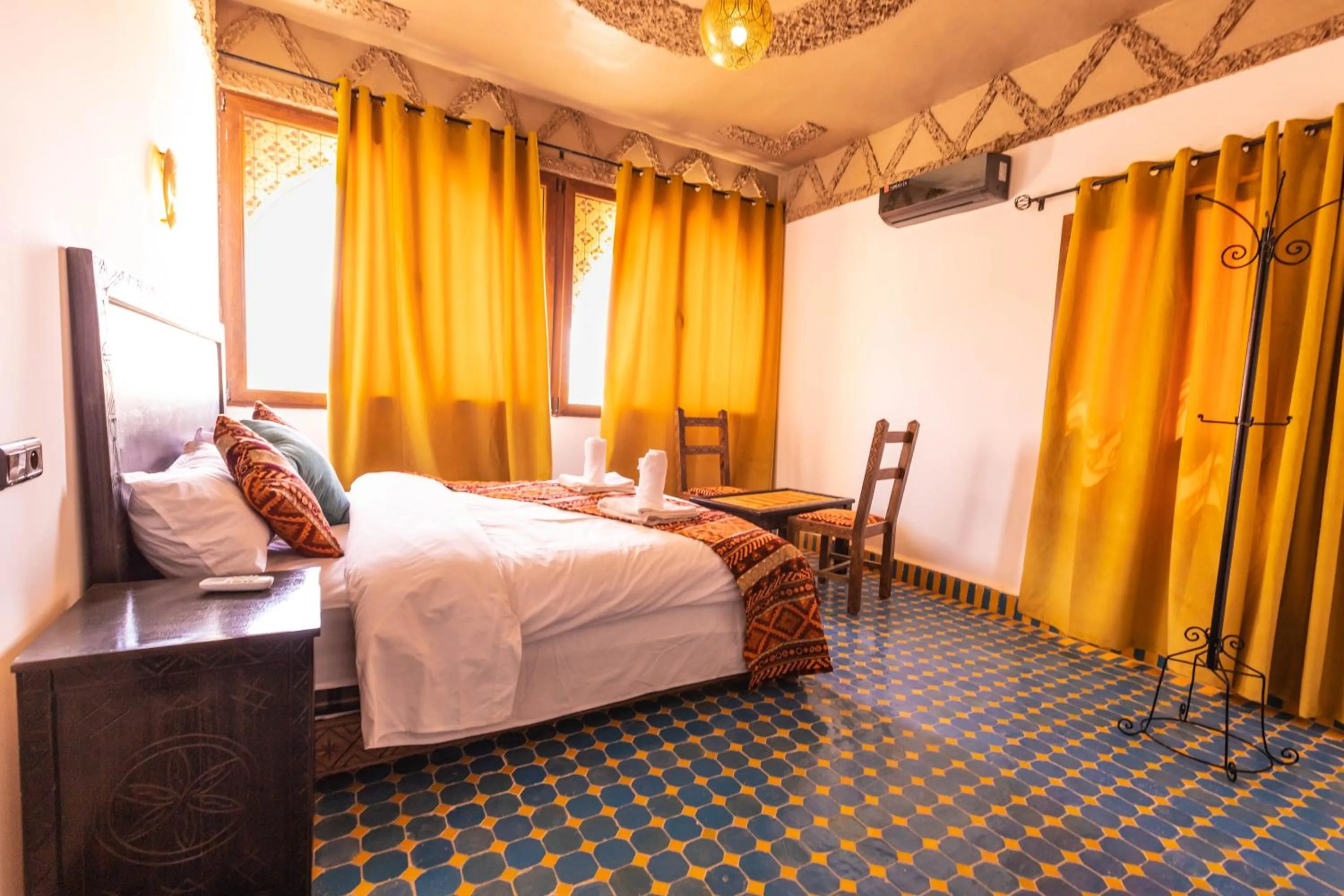 Bed in Riad Merzouga Dunes