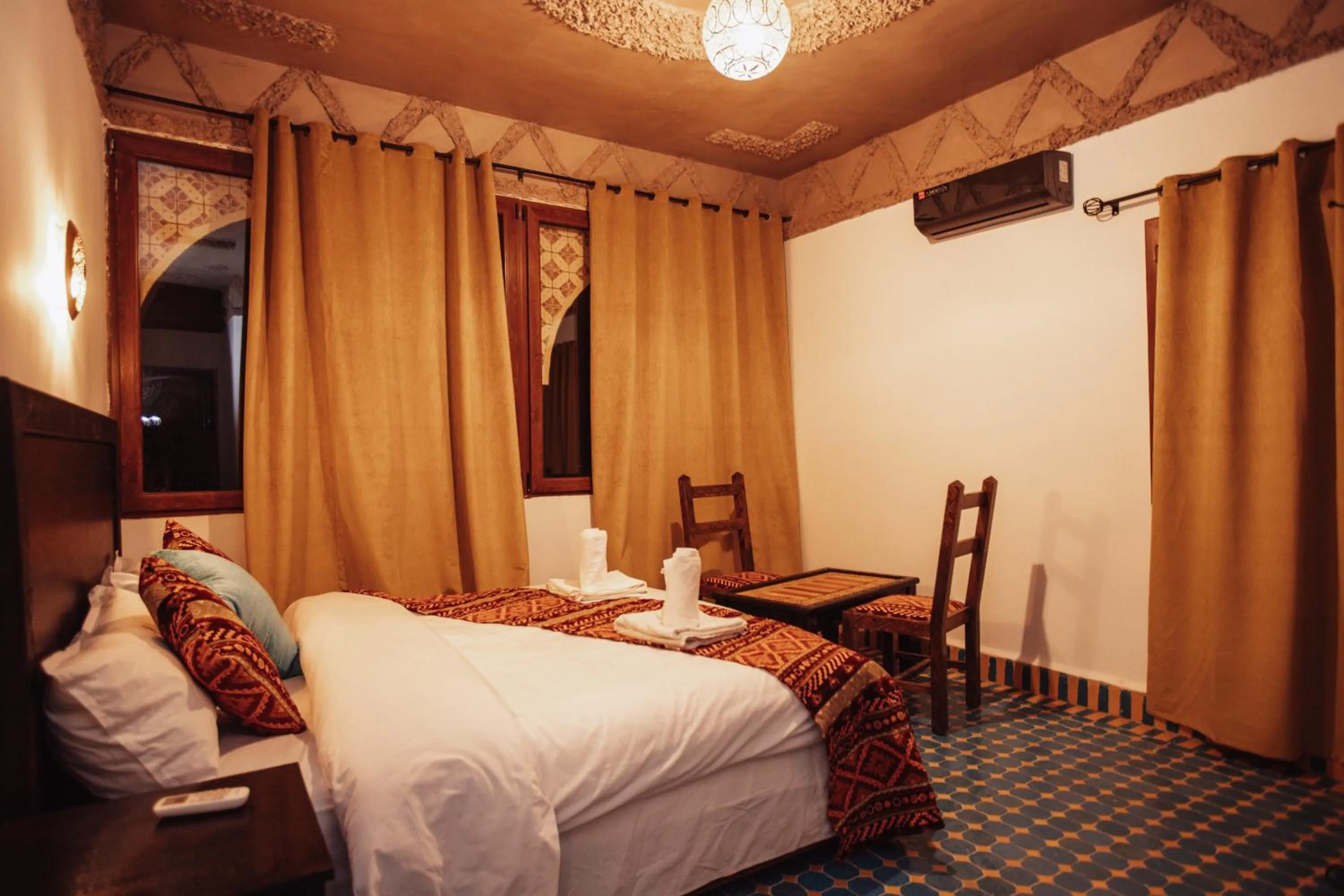 Bed in Riad Merzouga Dunes