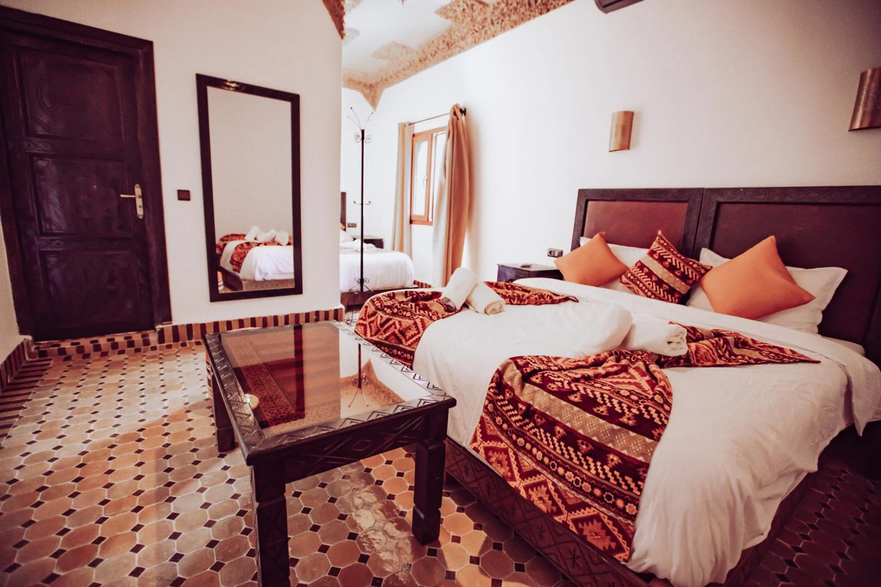 Bed in Riad Merzouga Dunes
