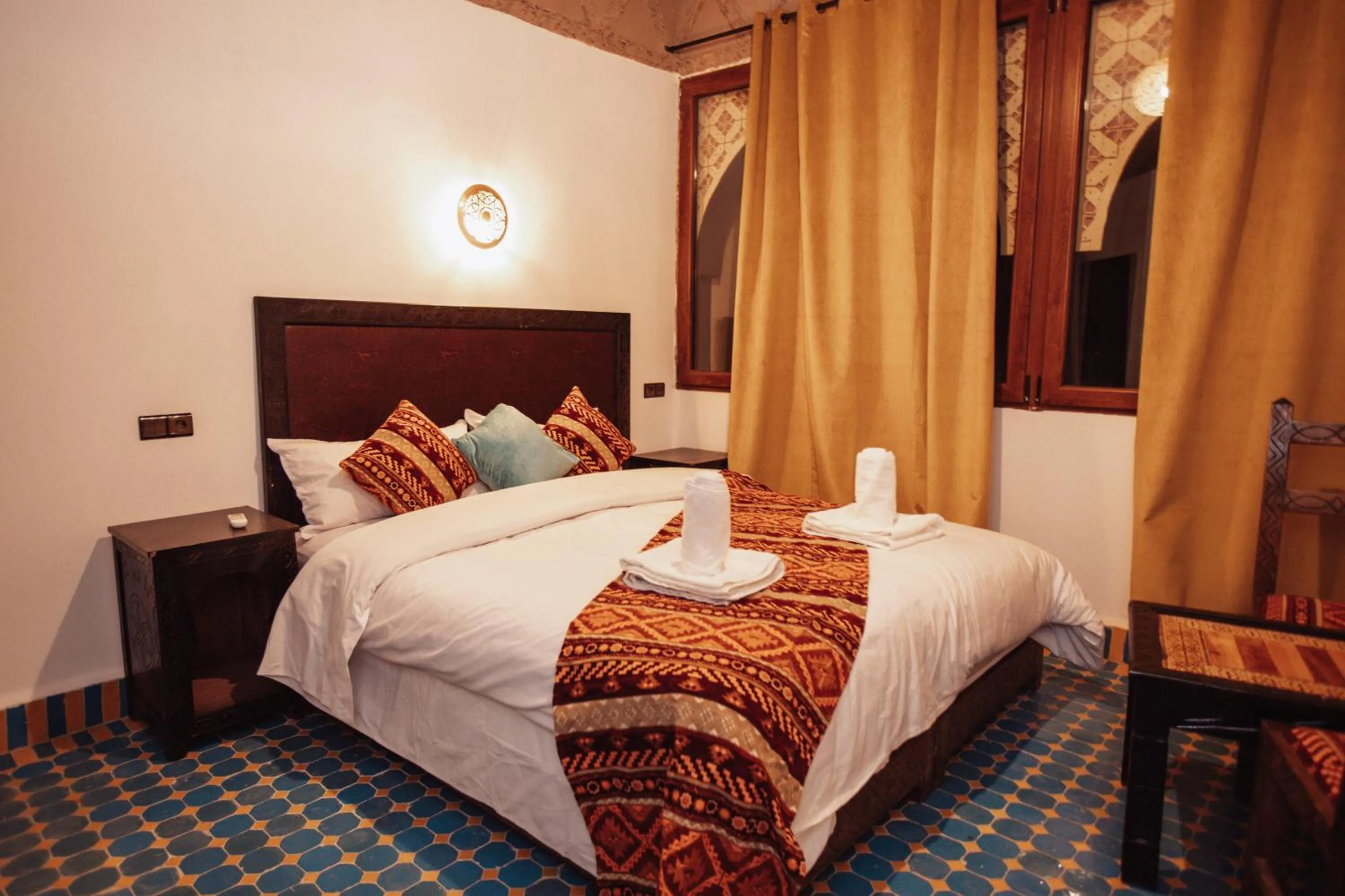 Bed in Riad Merzouga Dunes