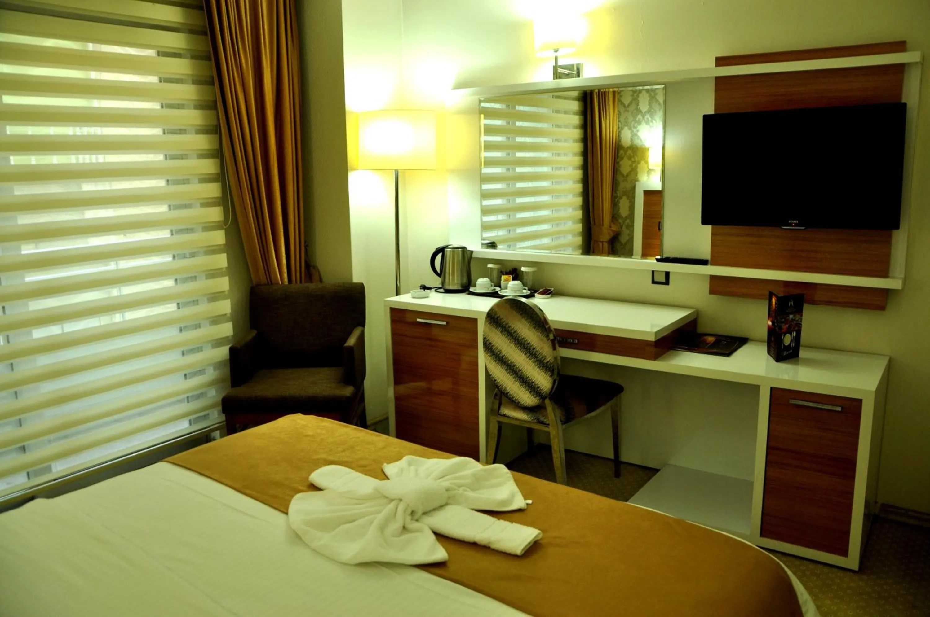 Photo of the whole room, Bed in The Ancient Mesopotamia Hotel